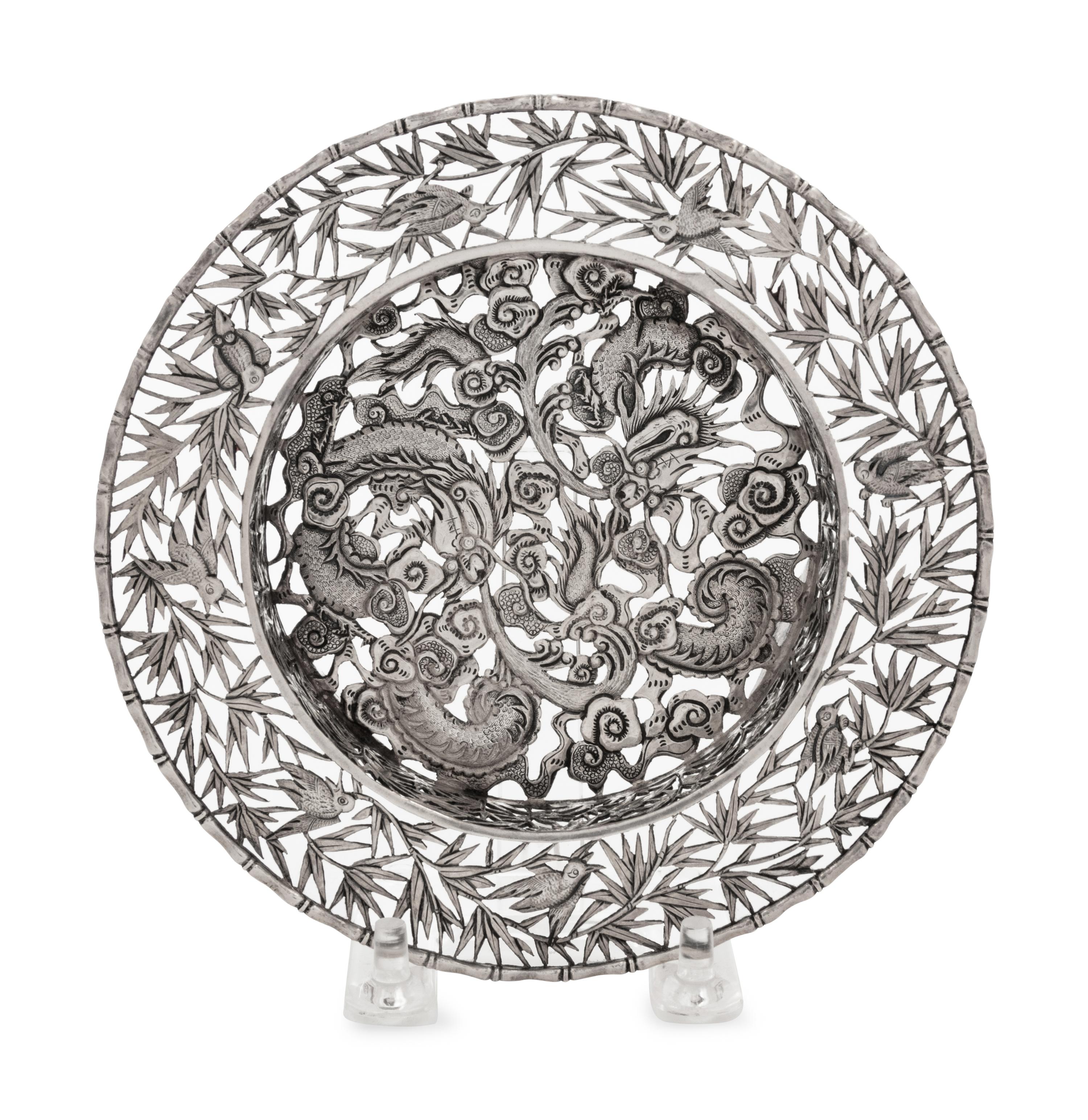 A Chinese Export Silver Tripod Dish