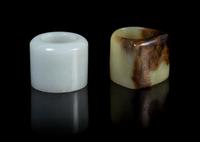 Two Jade Archer's Rings Diameter of larger 1 3/8 inches.