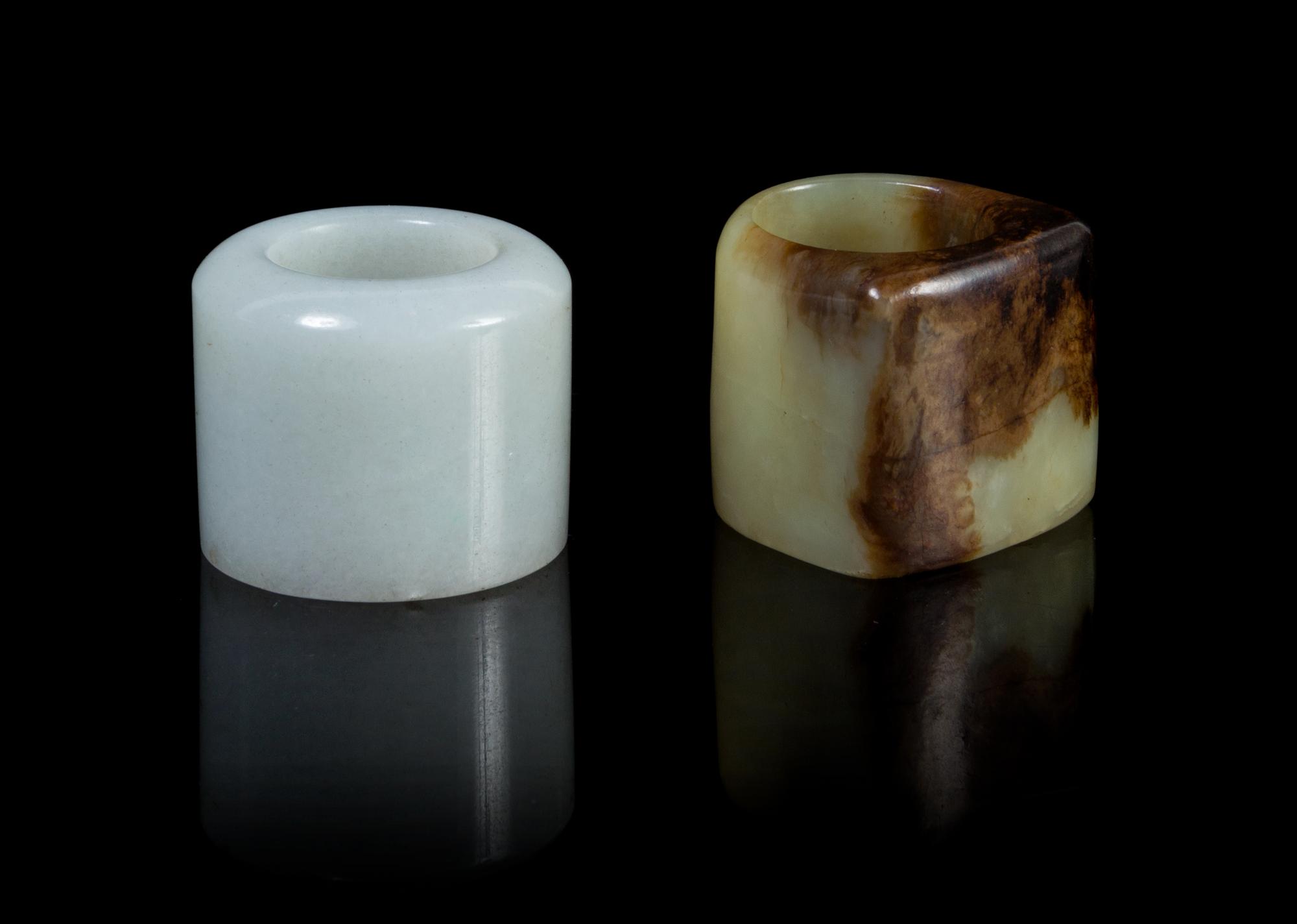 Two Jade Archer's Rings Diameter of larger 1 3/8 inches.