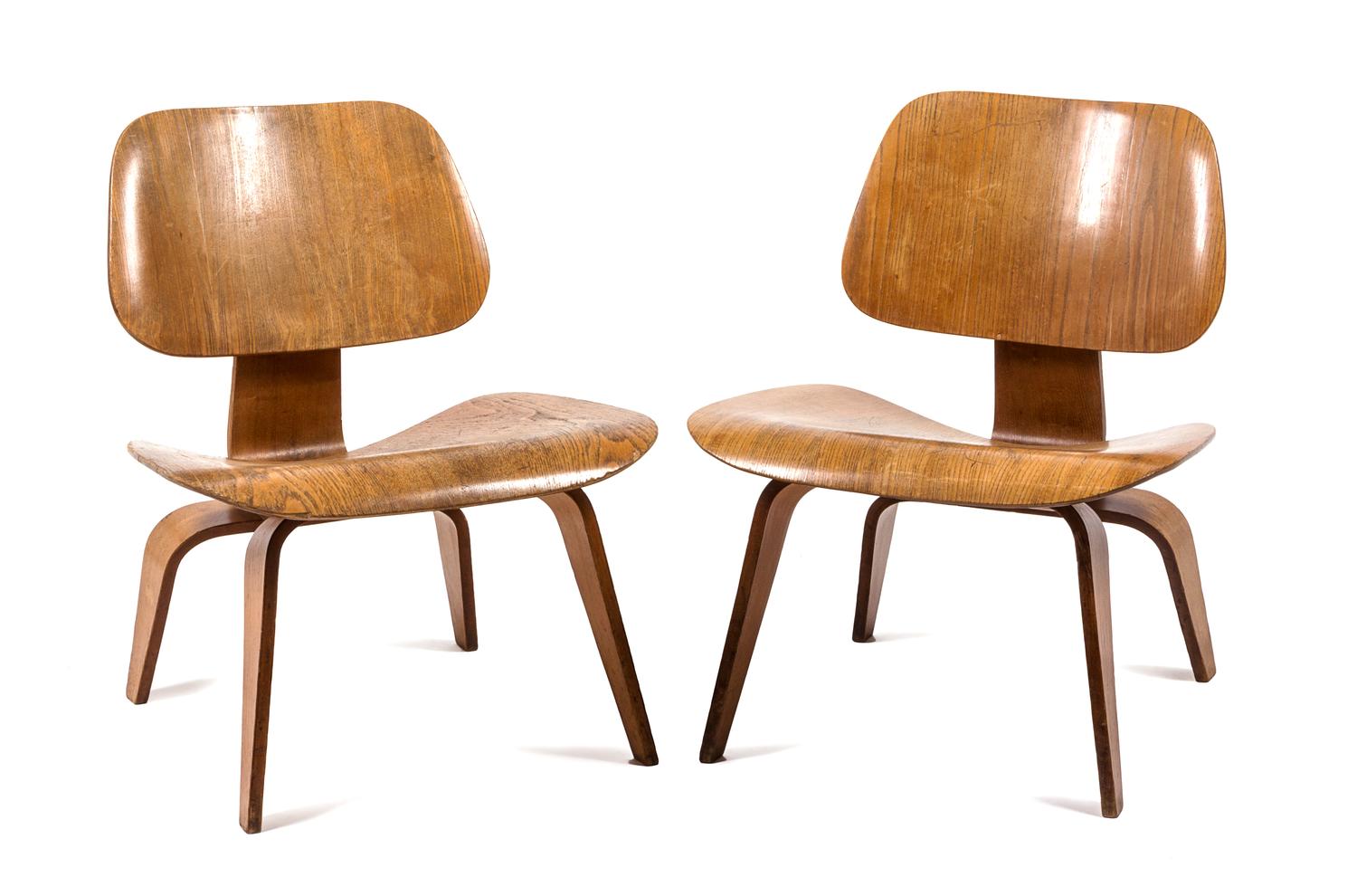 A Pair of LCW Lounge Chairs, Charles and Ray Eames Height 26 1/4 x width 17 1/2 x depth 19 1/2 inches.