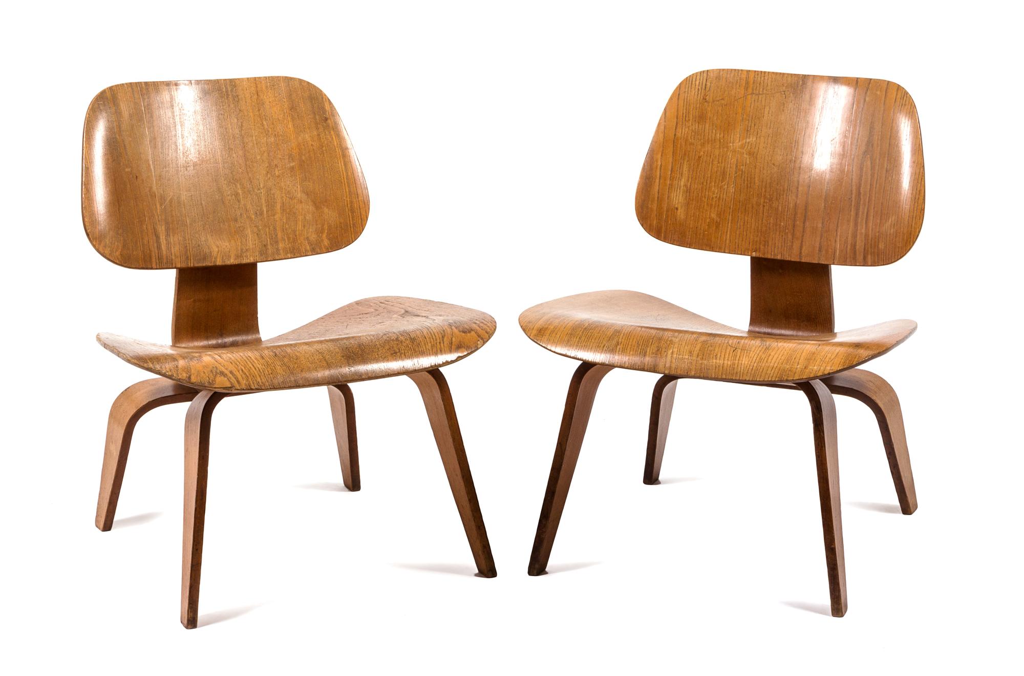 A Pair of LCW Lounge Chairs, Charles and Ray Eames Height 26 1/4 x width 17 1/2 x depth 19 1/2 inches.