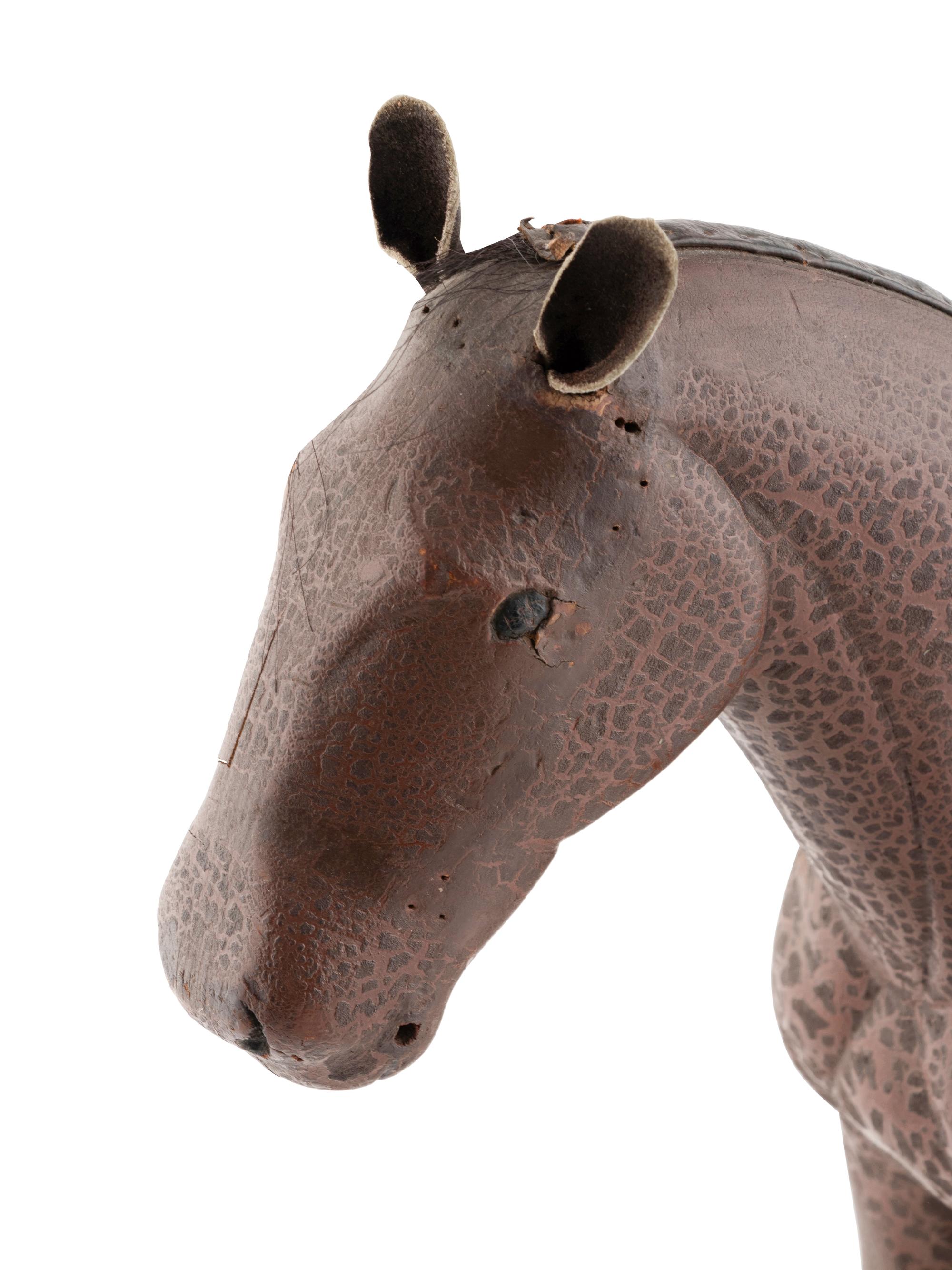 A Folk Art Carved and Painted Wooden Horse
