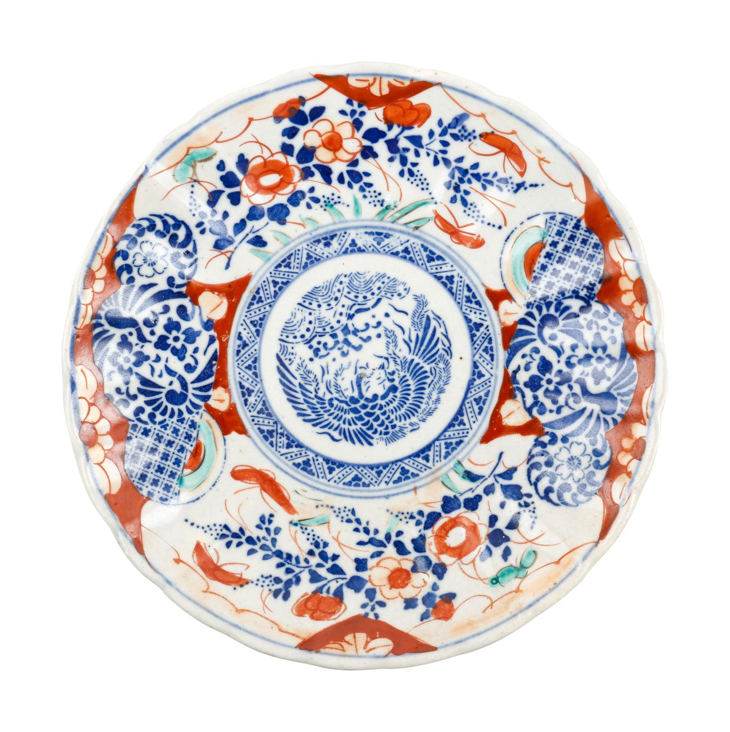 A Group of Eight Imari Pattern Porcelain Plates