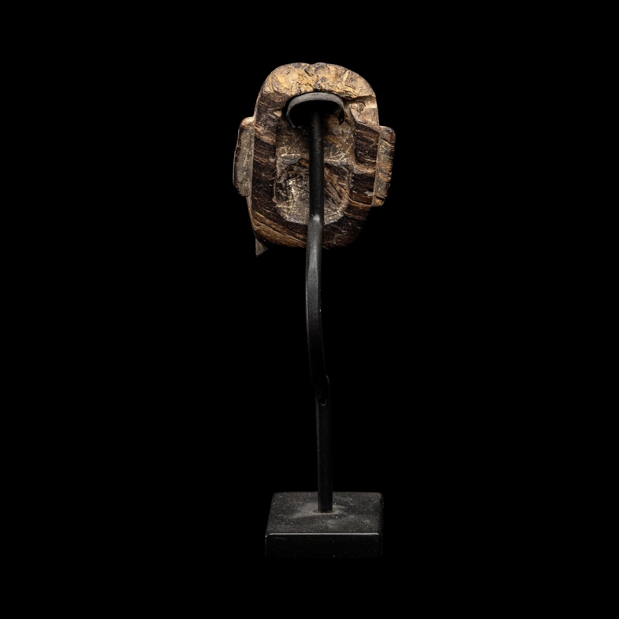 A Maya Wood Head Pendant