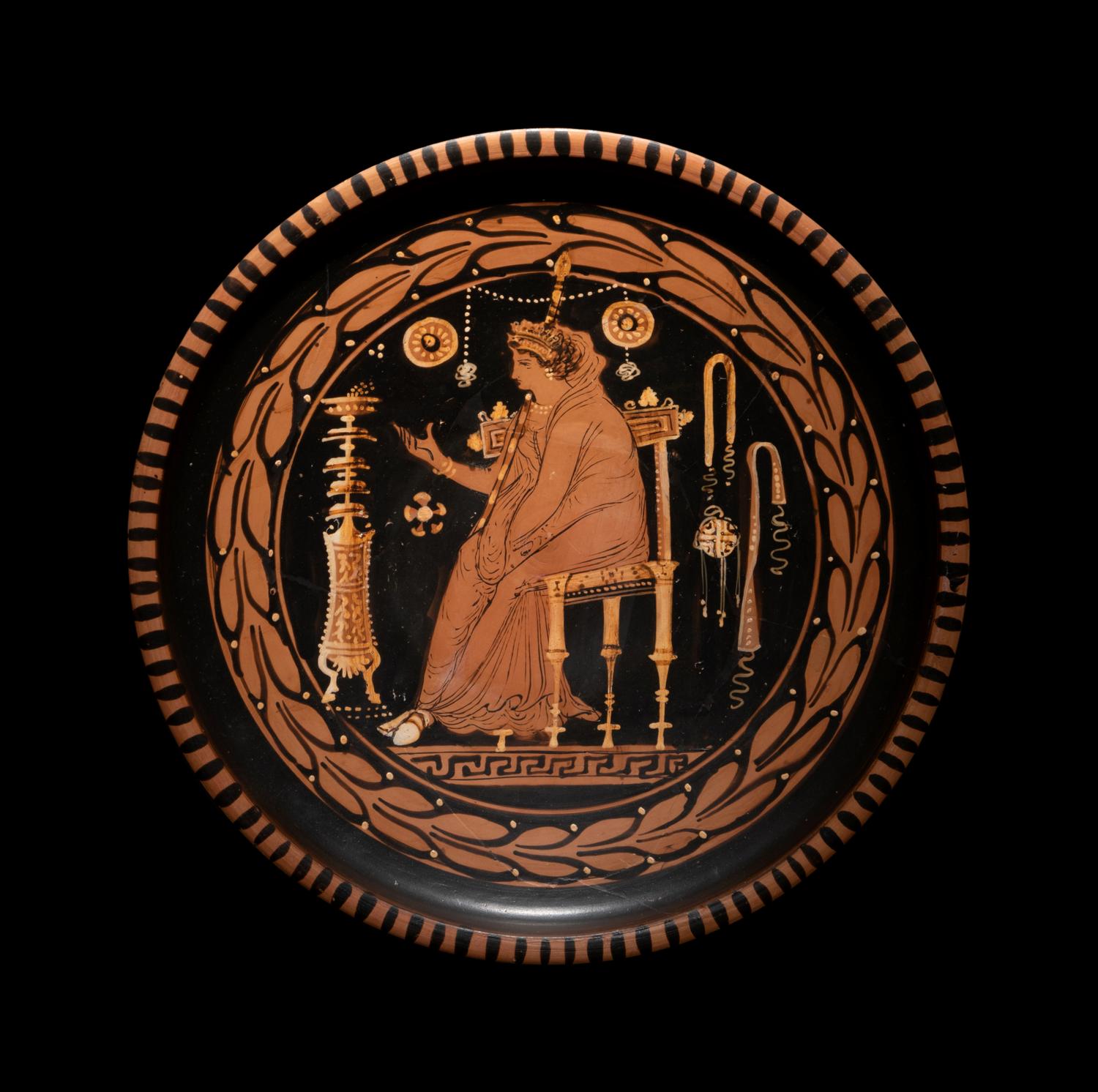 An Apulian Red-Figured Plate with a Seated Goddess or Priestess