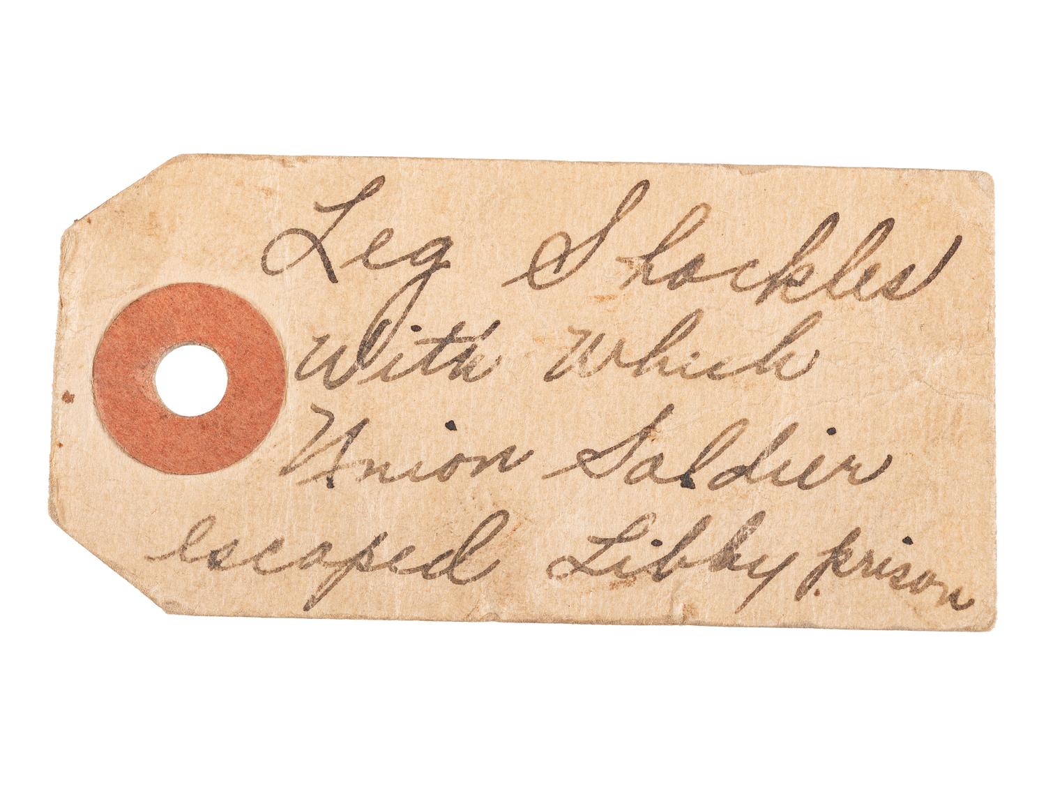 Libby Prison shackles worn by escaped Union soldier with vintage tag.
