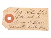 Libby Prison shackles worn by escaped Union soldier with vintage tag.