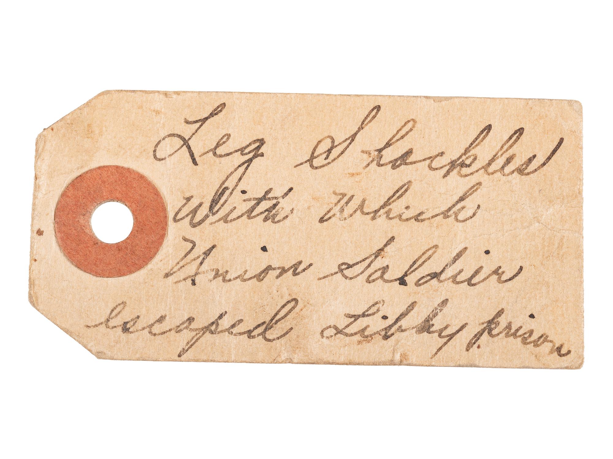 Libby Prison shackles worn by escaped Union soldier with vintage tag.