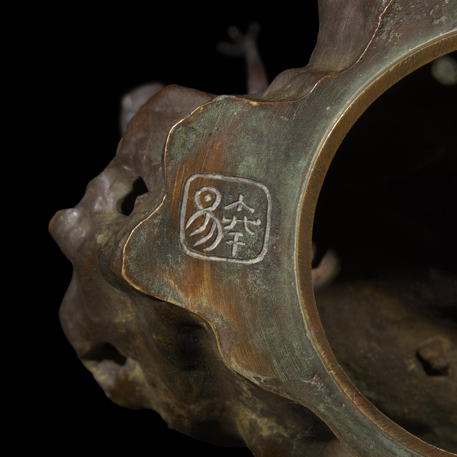 A Japanese Patinated Bronze and Metal S hoki and Oni Figural Koro, Meiji Period 日本明治時代 銅雕鍾馗捉鬼