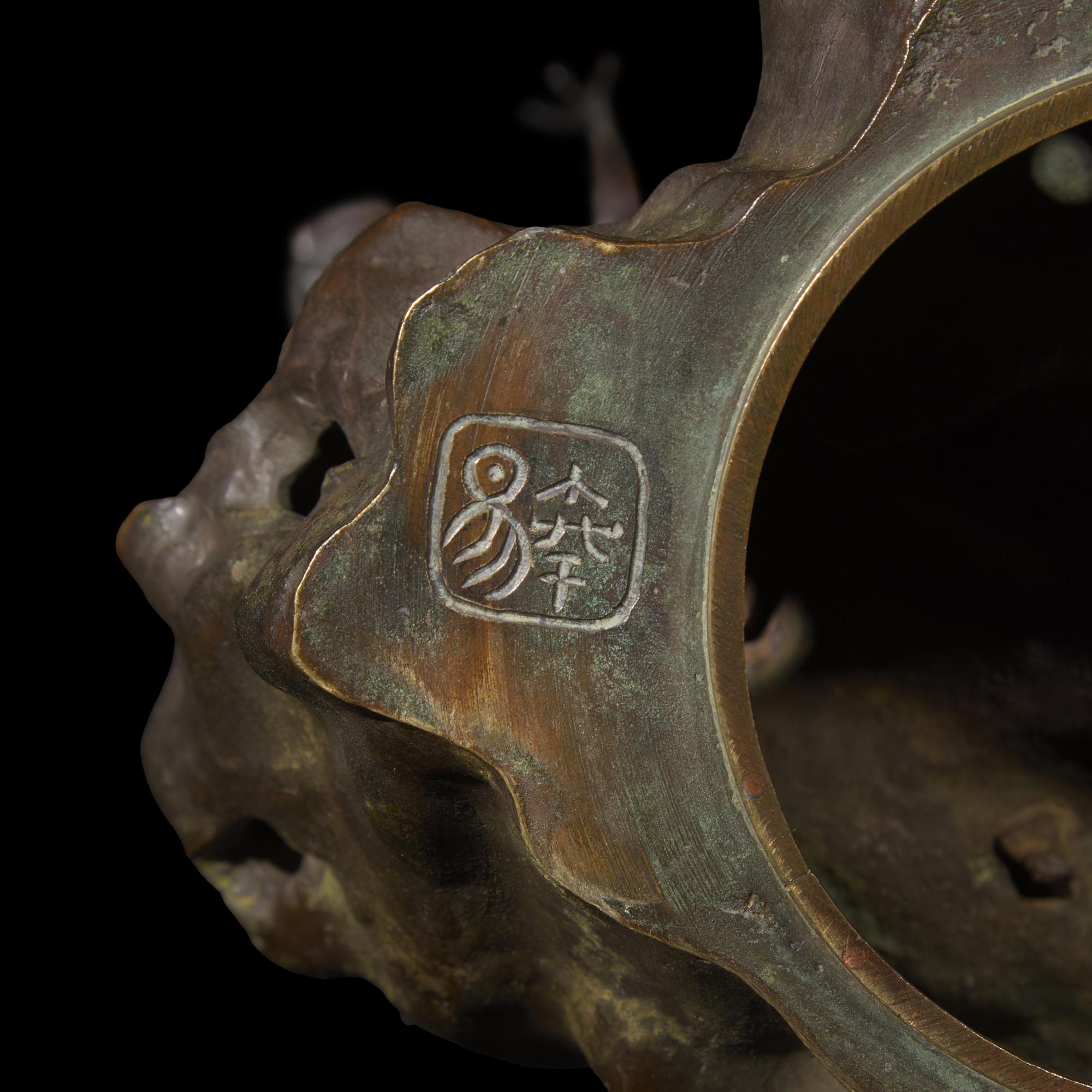 A Japanese Patinated Bronze and Metal S hoki and Oni Figural Koro, Meiji Period 日本明治時代 銅雕鍾馗捉鬼