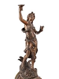 A French Cast Metal and Marble Figural Clock