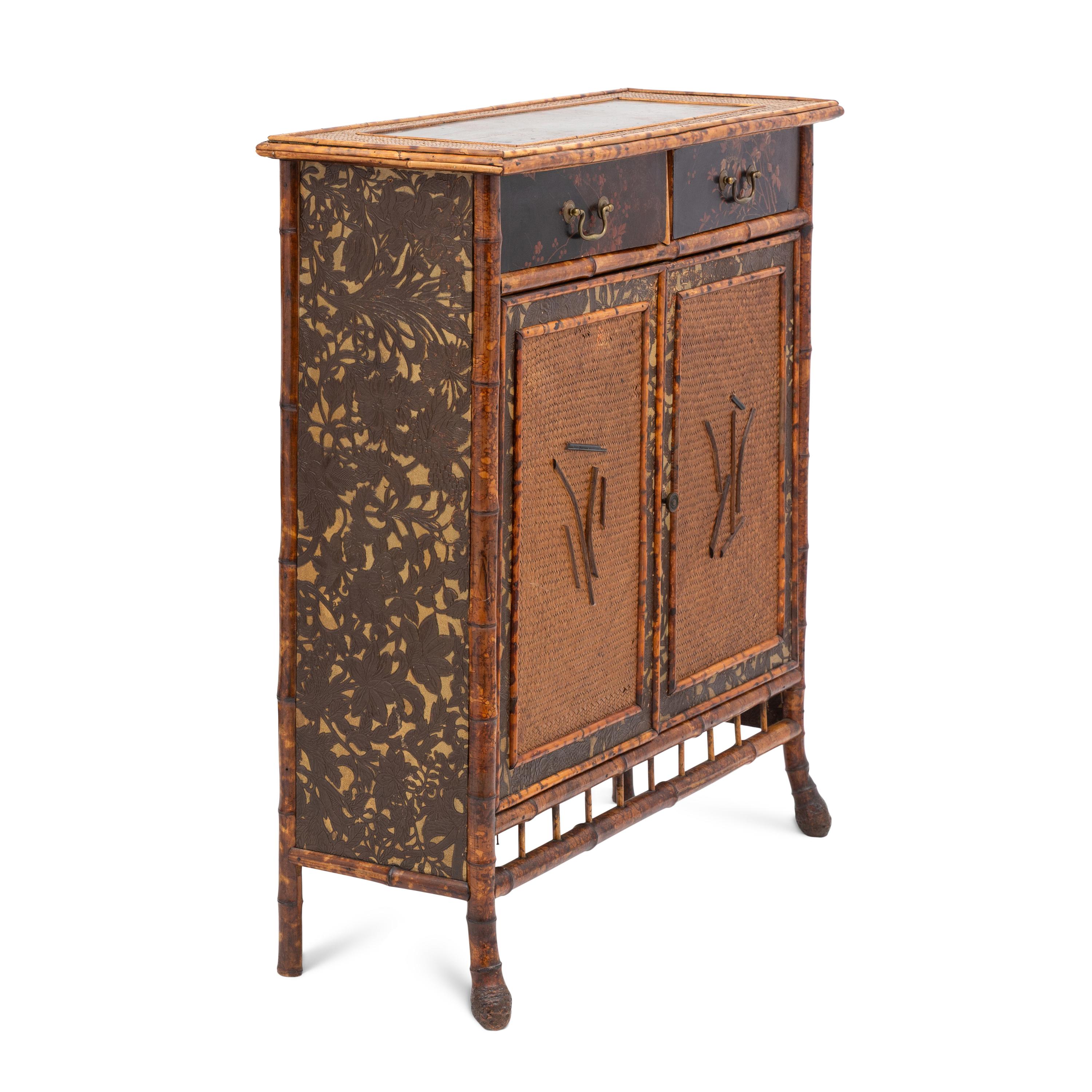A Victorian Aesthetic Movement Burnt Bamboo Side Cabinet