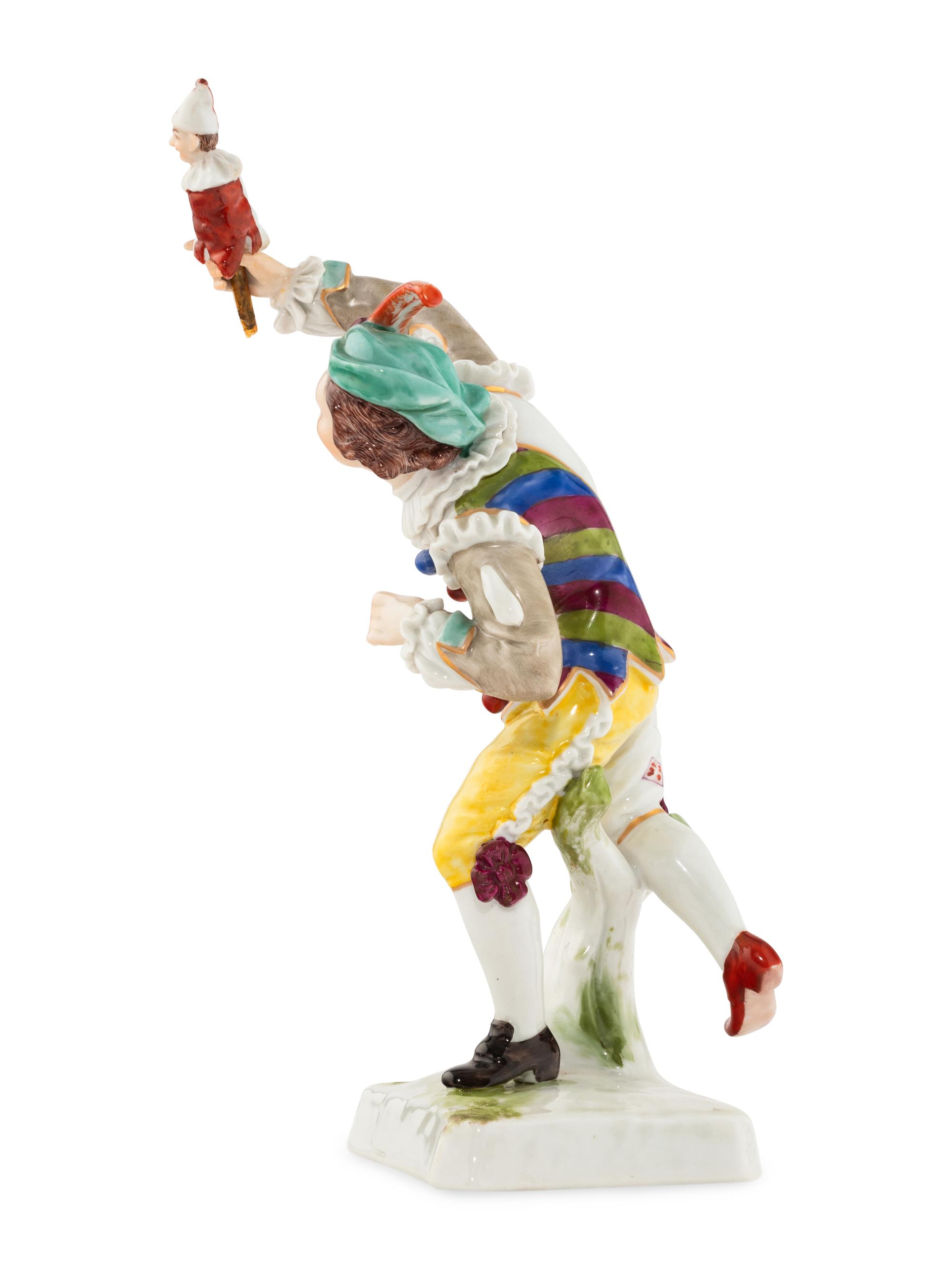 A Chelsea Porcelain Harlequin Figure