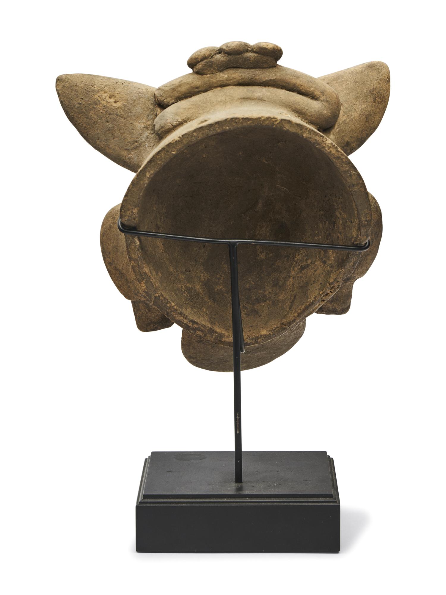 A Maya Polychrome Terracotta Head of a Deity