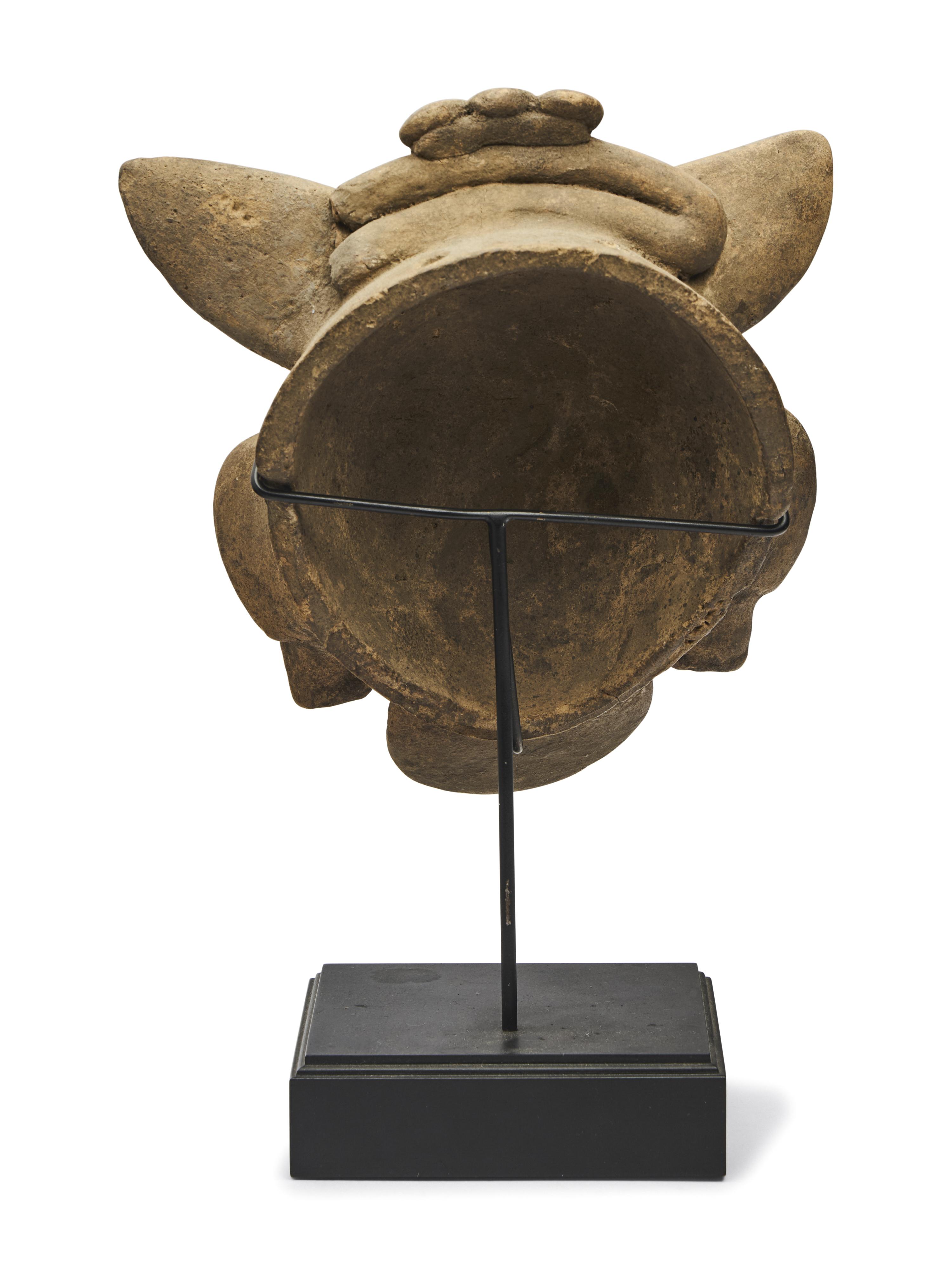 A Maya Polychrome Terracotta Head of a Deity