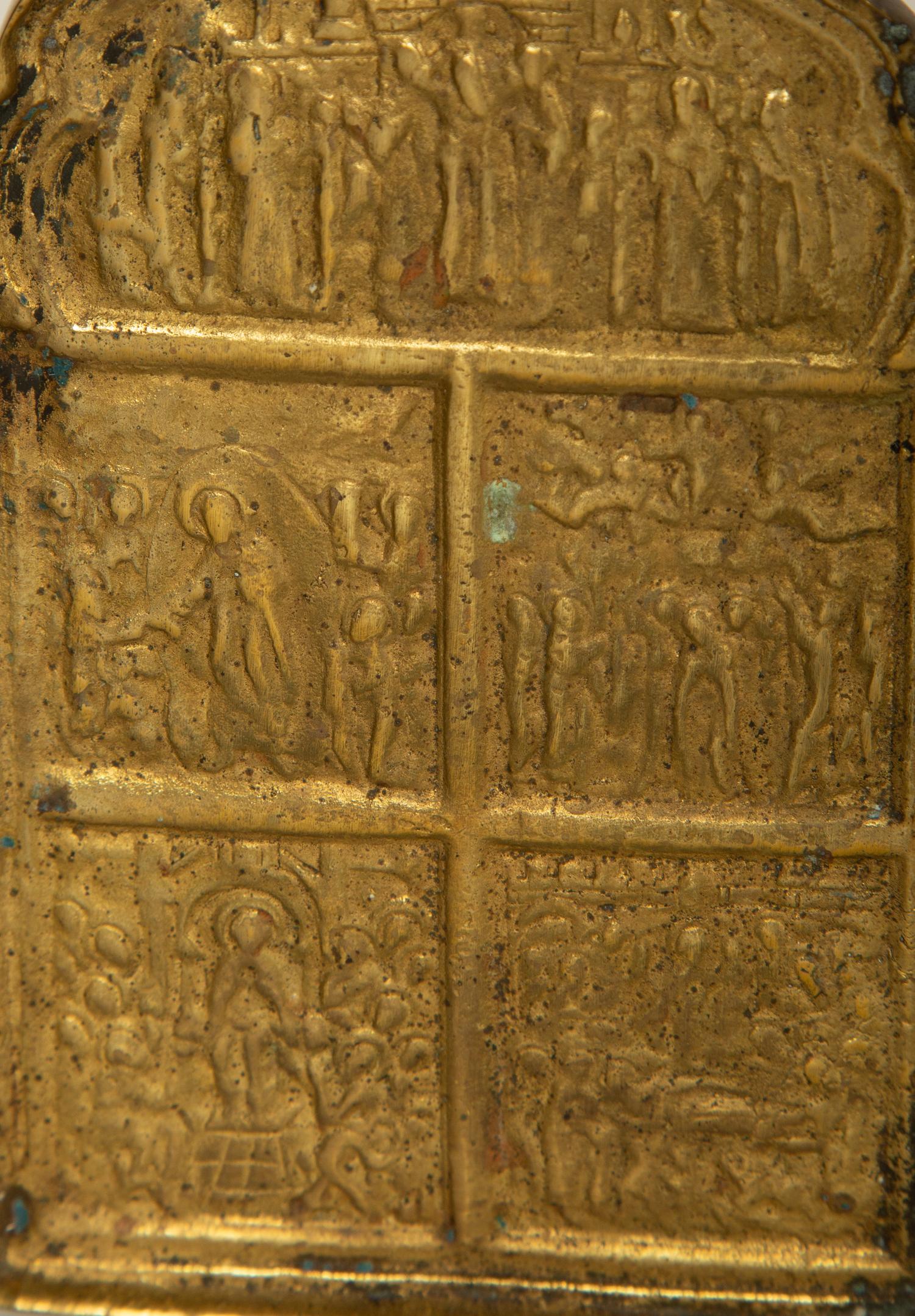 A Painted Russian Icon of Christ Enthroned Surrounded by Saints and a Brass Four-Panel Travel Prayer Icon