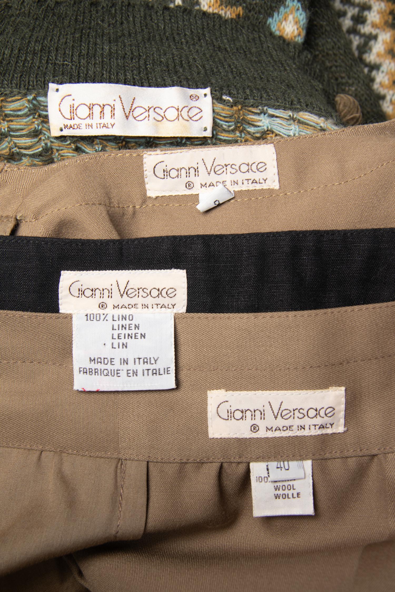 One Gianni Versace Ensemble and Two Tops