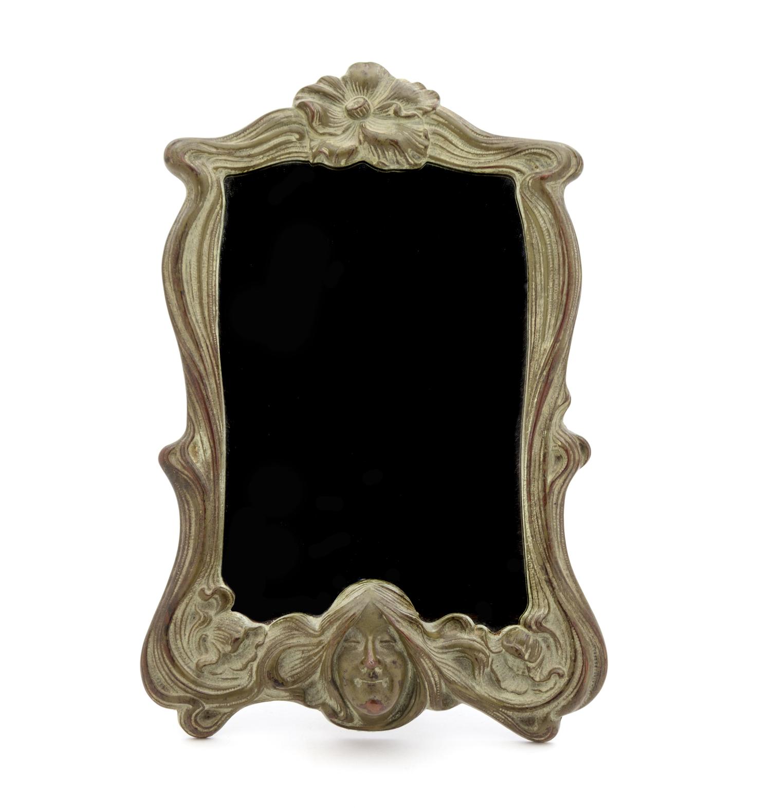 An Art Nouveau Bronze Dressing Mirror 12 1/2 x 7 3/4 inches.