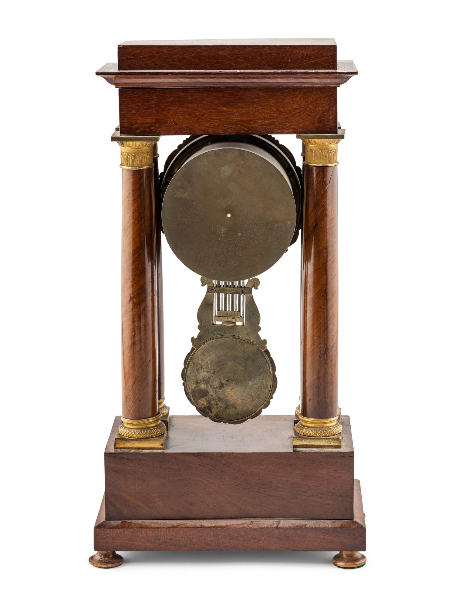A Charles X Gilt Bronze Mounted Mahogany Mantel Clock