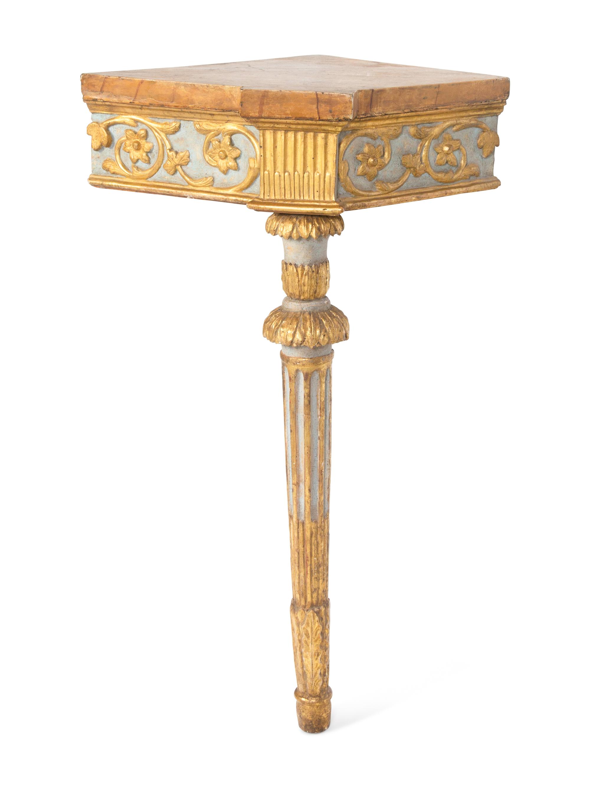 A Pair of Italian Carved, Painted and Giltwood Corner Console Tables