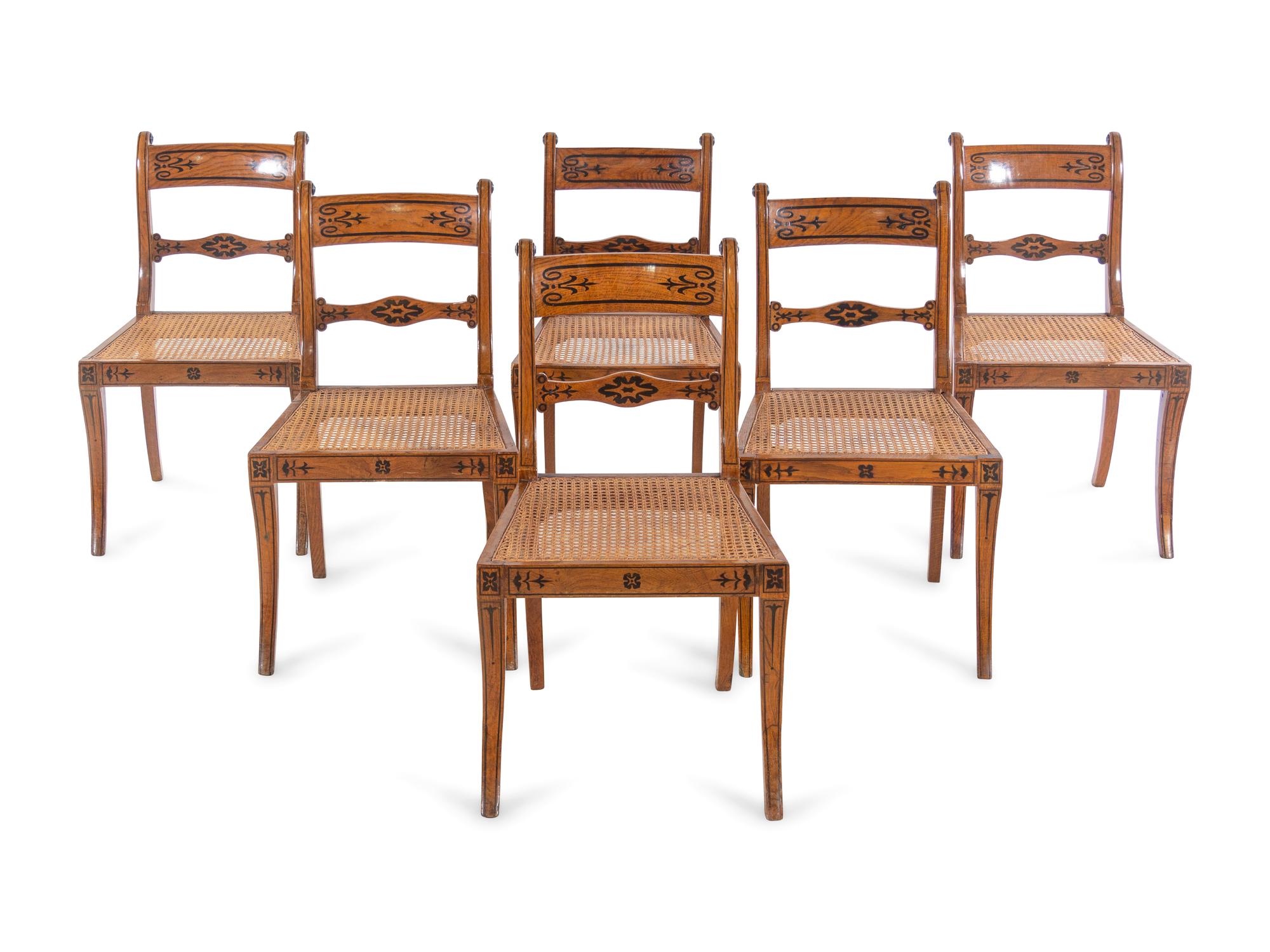 A Set of Six Continental Ebony Inlaid Fruitwood Dining Chairs