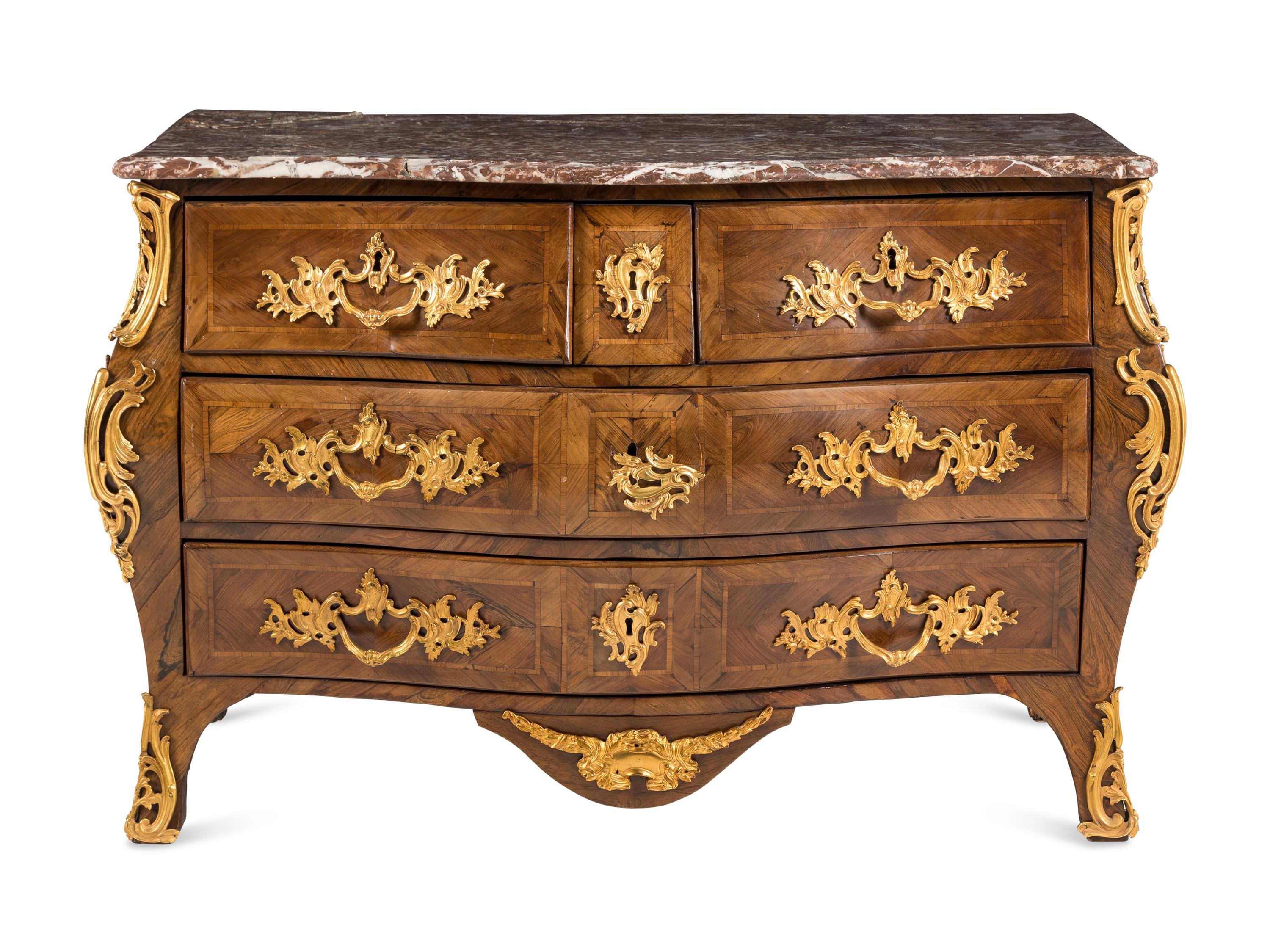 A Louis XV Gilt Bronze Mounted Tulipwood Commode