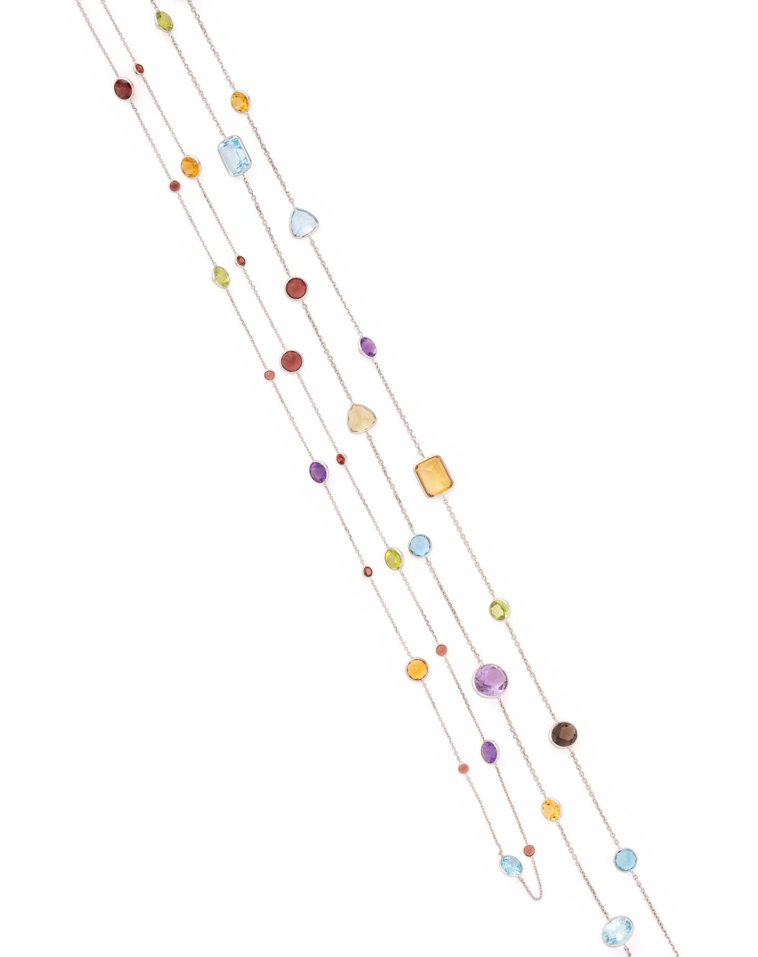 COLLECTION OF WHITE GOLD AND MULTIGEM LONGCHAIN NECKLACES