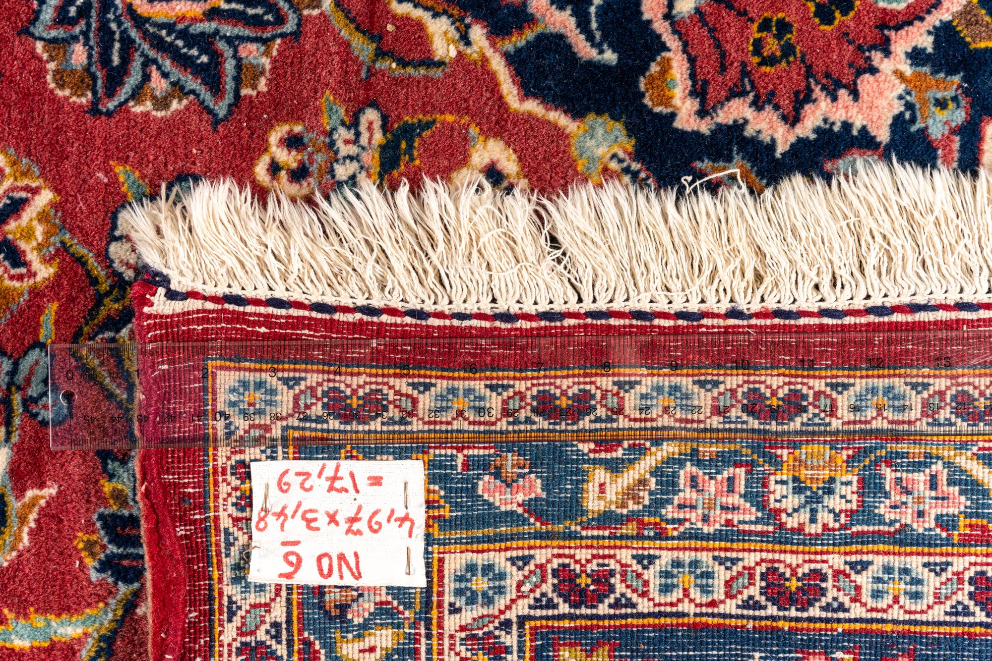 A Kashan Wool Rug
