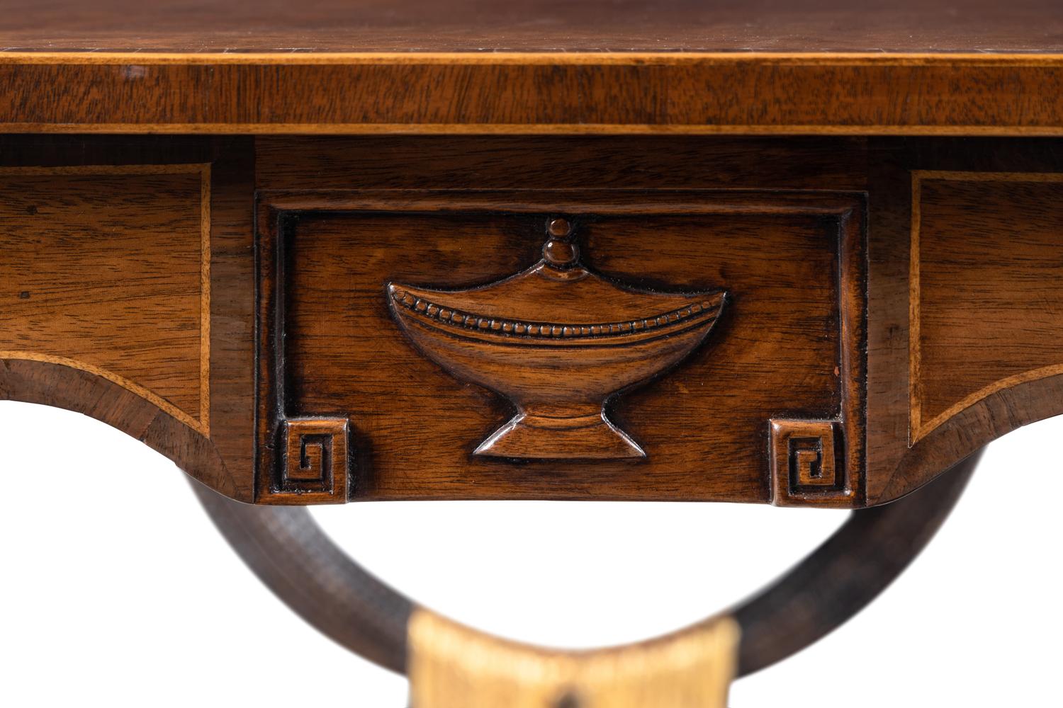 A Regency Style Inlaid Mahogany, Ebonized and Parcel-Gilt Side Table