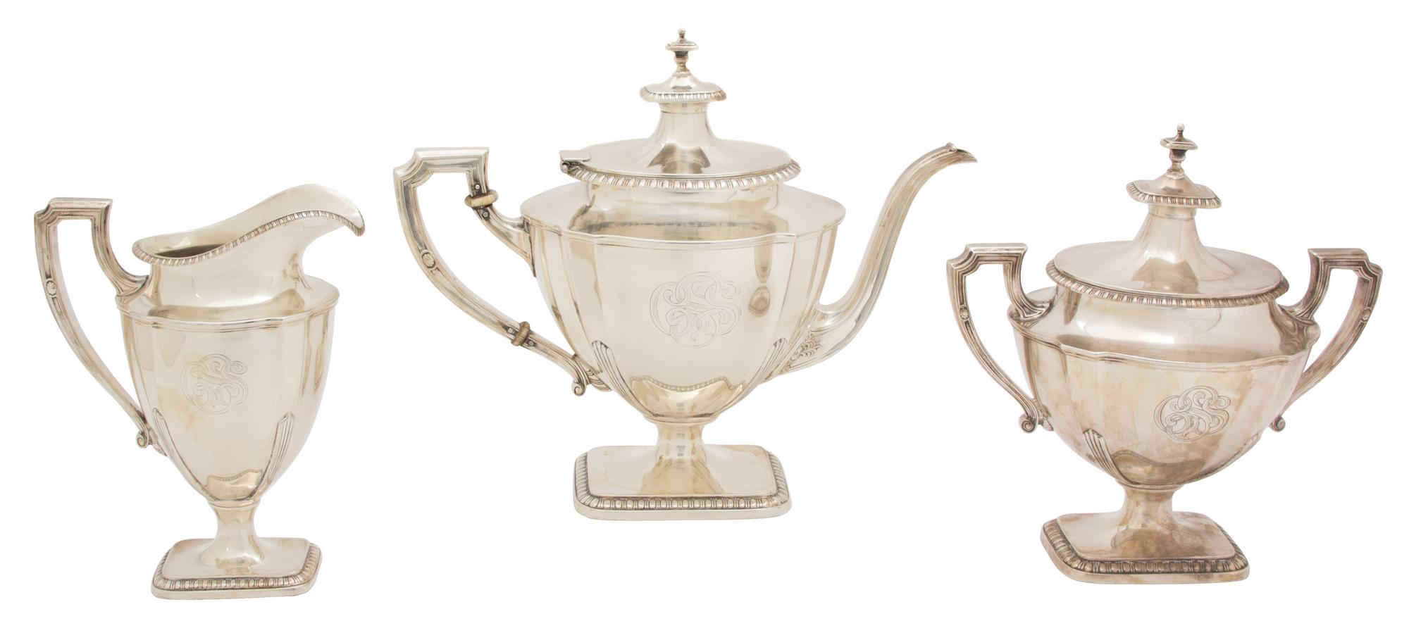 An American Silver Three Piece Tea Service, Reed & Barton, 20th Century, St. George pattern, comprising a teapot, creamer and covered s