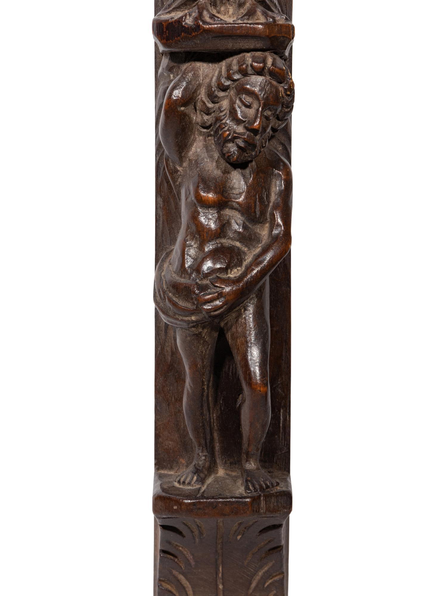 A Pair of Continental Carved Figural Pilasters