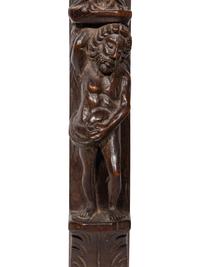 A Pair of Continental Carved Figural Pilasters