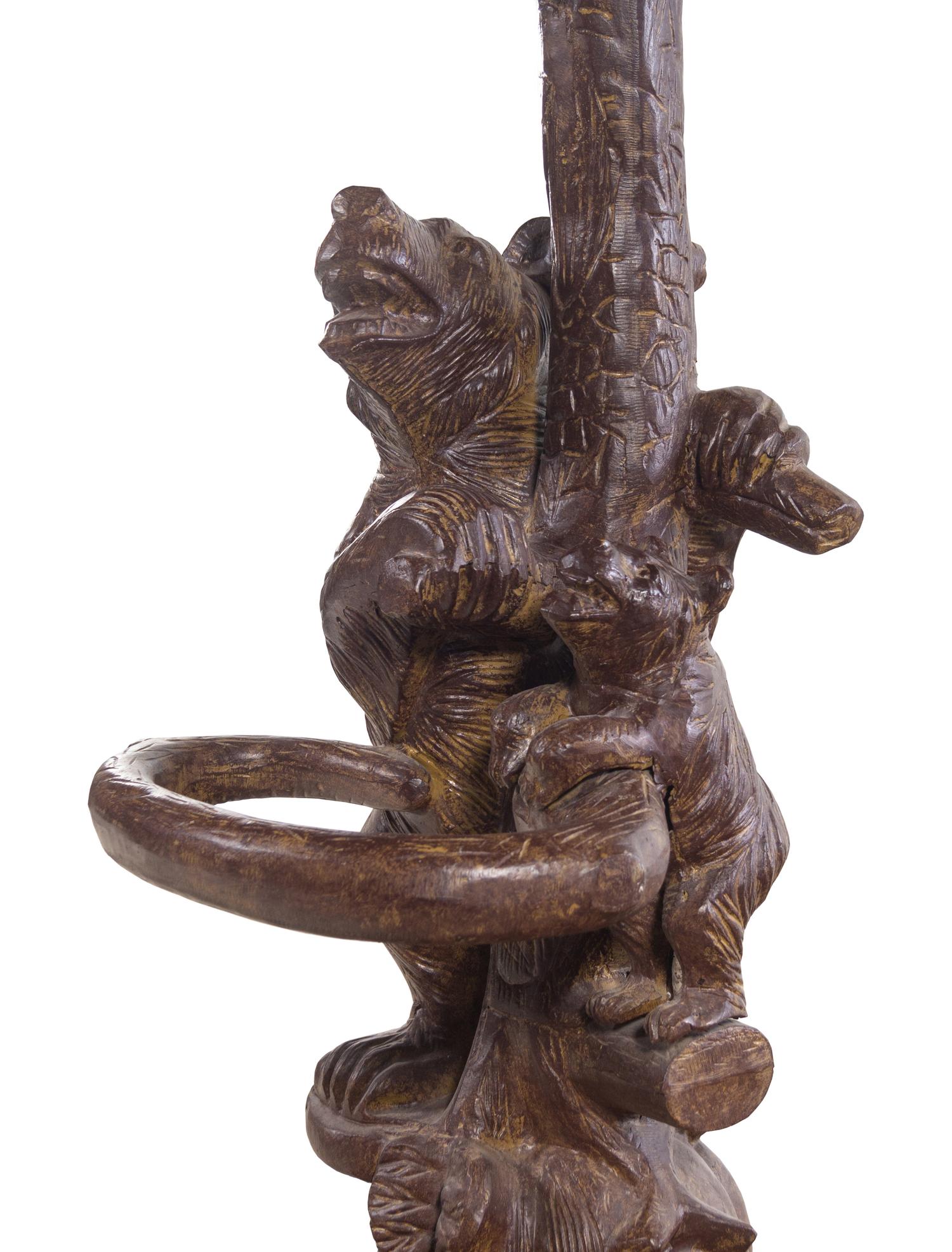 A Black Forest Style Patinated Metal Hall Tree