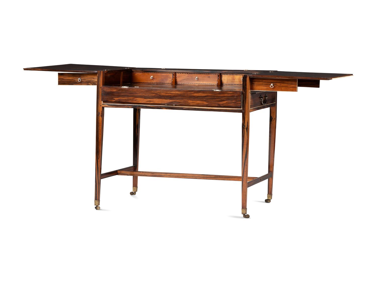 A Regency Ivory Inlaid and Silver Mounted Calamander Campaign Desk