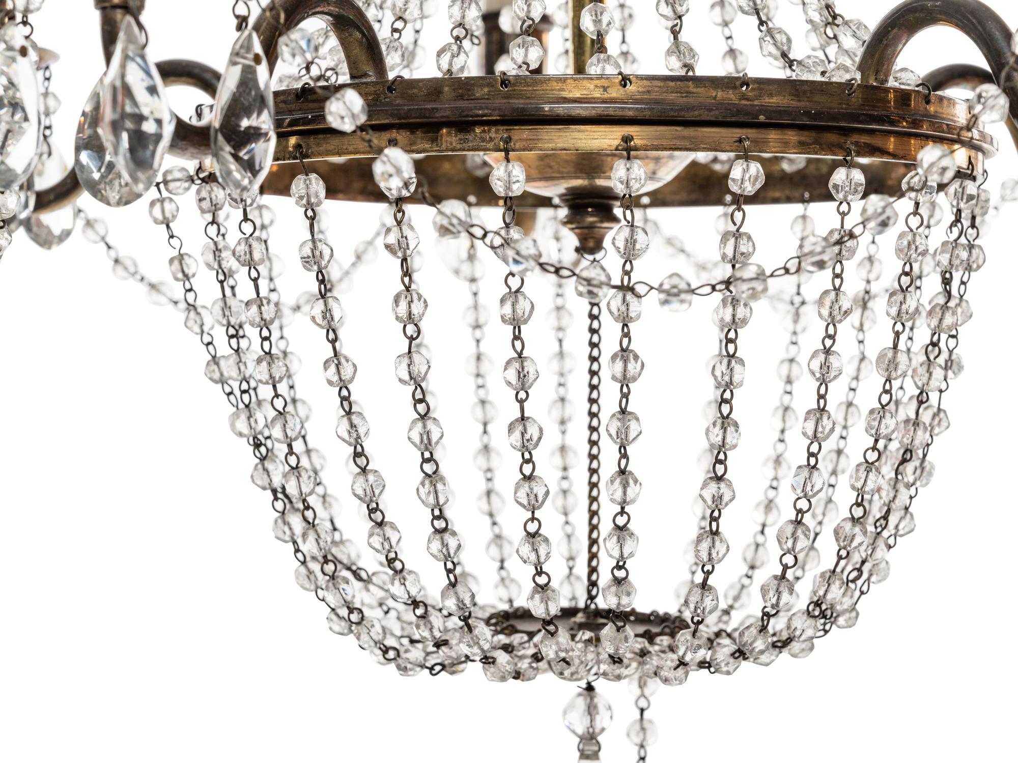 An Empire Style Brass and Cut Glass Five-Light Chandelier