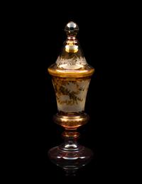A Collection of Bohemian Amber Cut to Clear Glassware