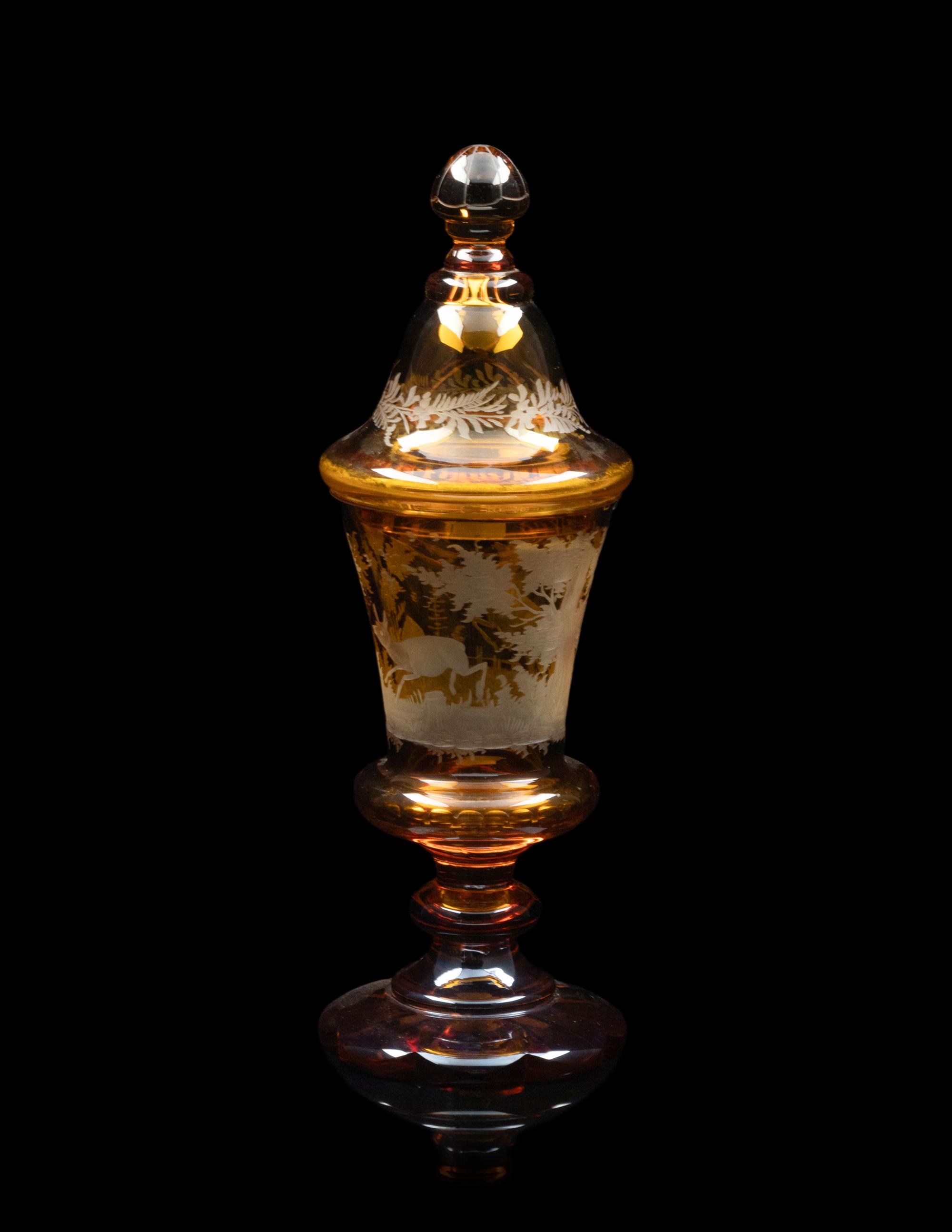 A Collection of Bohemian Amber Cut to Clear Glassware