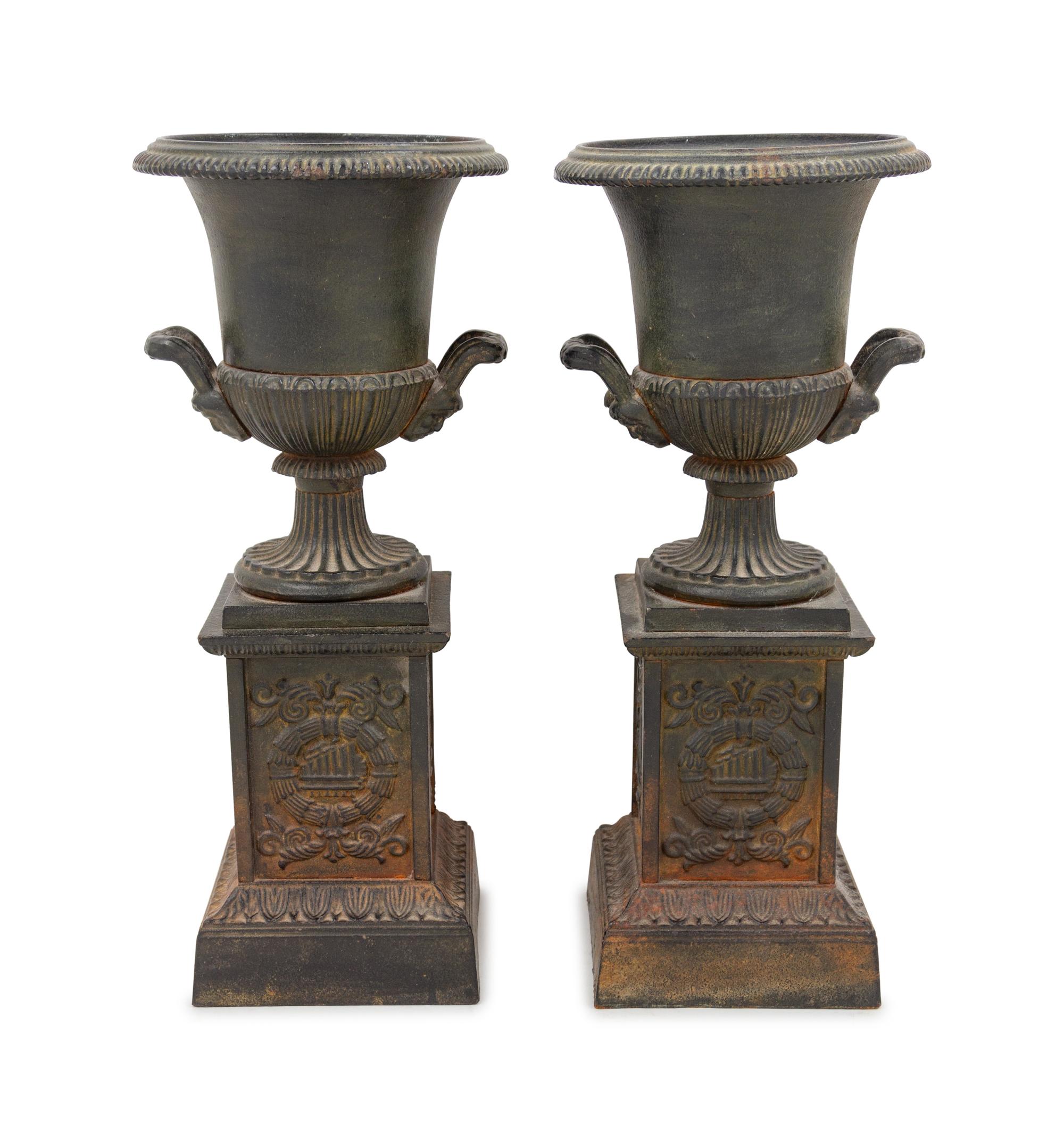 A Pair of French Cast Iron Urns