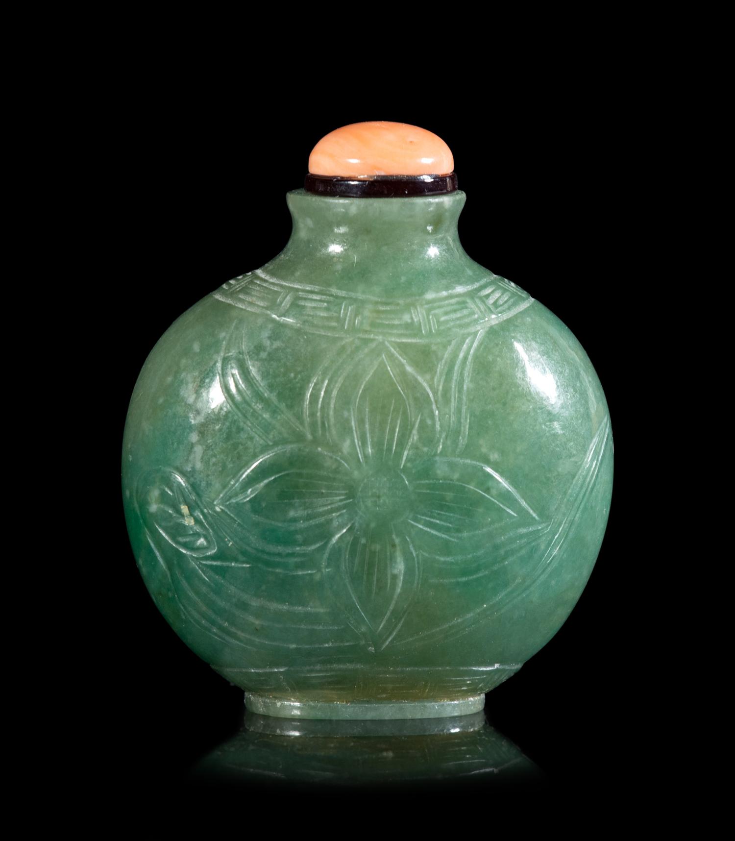 A Chinese Carved Jadeite Snuff Bottle