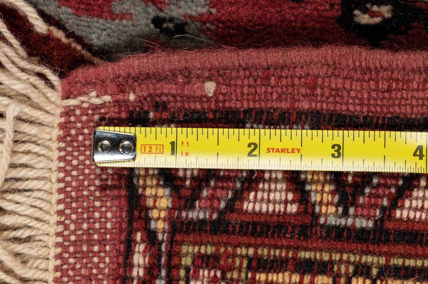 Four Turkish Wool Mats and a Baluch Design Wool Mat