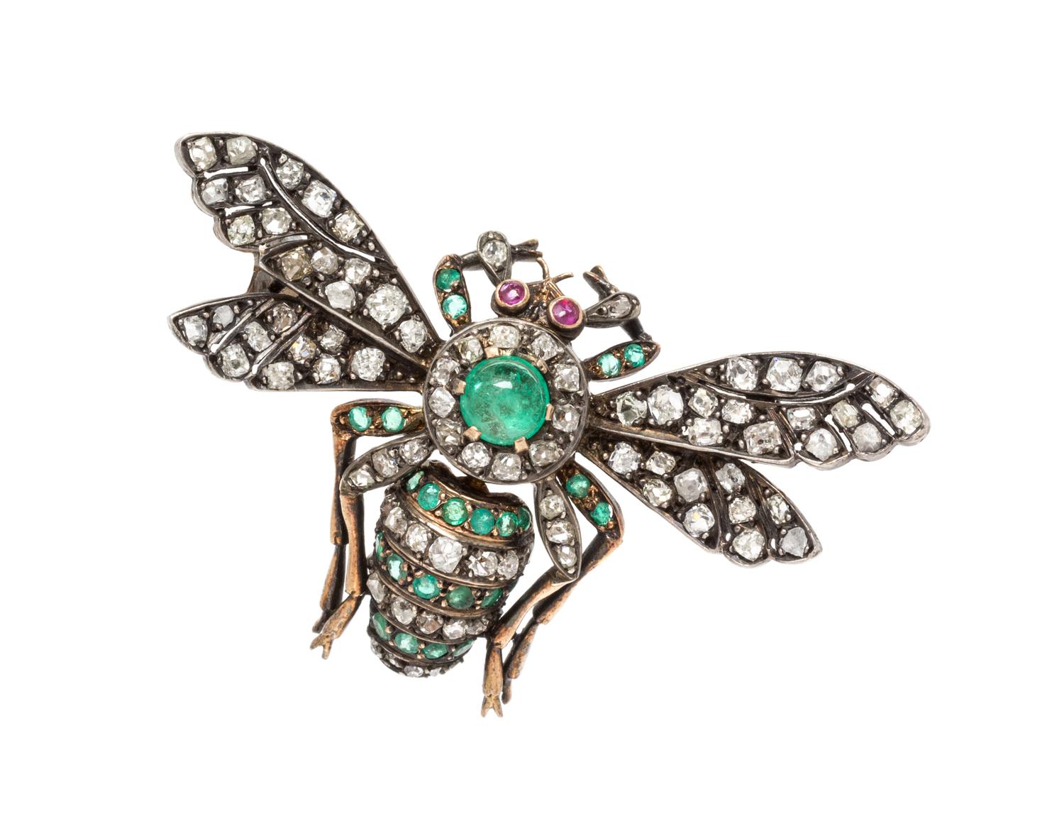 A Silver Topped Yellow Gold, Emerald, Diamond and Ruby Insect Brooch, 7.60 dwts.