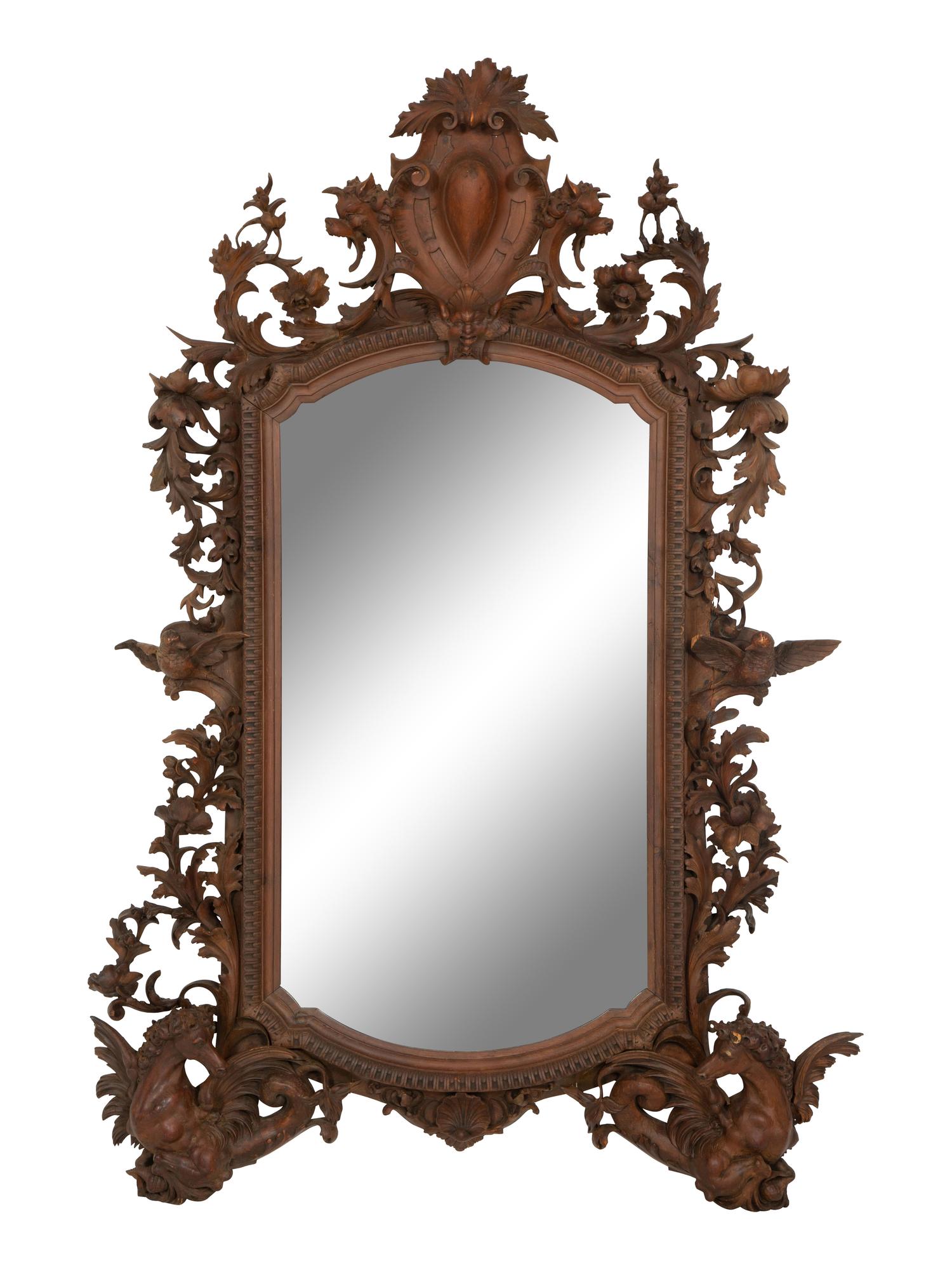 A Continental Foliate Carved Mirror