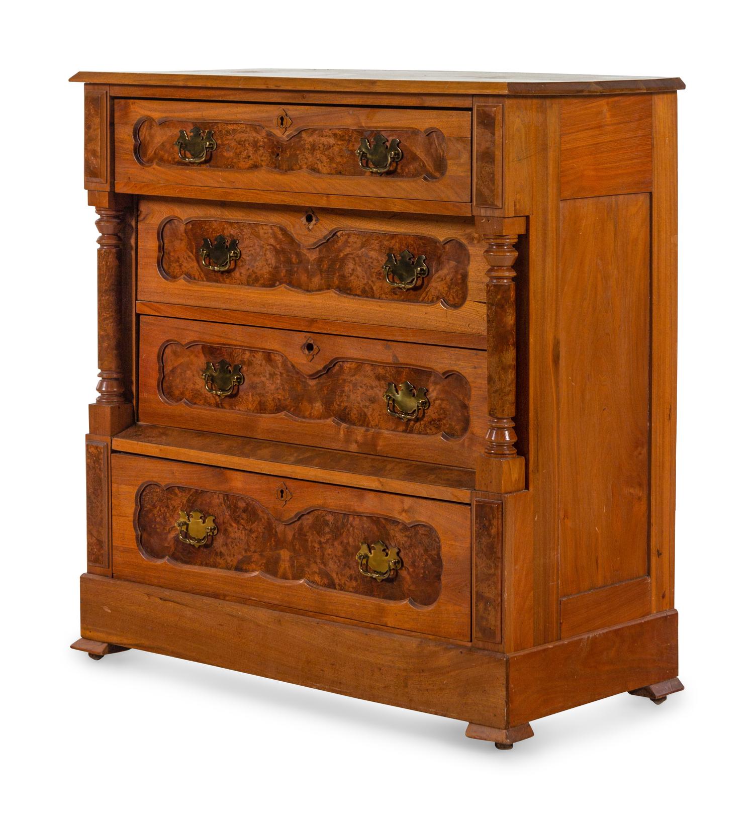 An American Eastlake Walnut and Maple Chest of Drawers