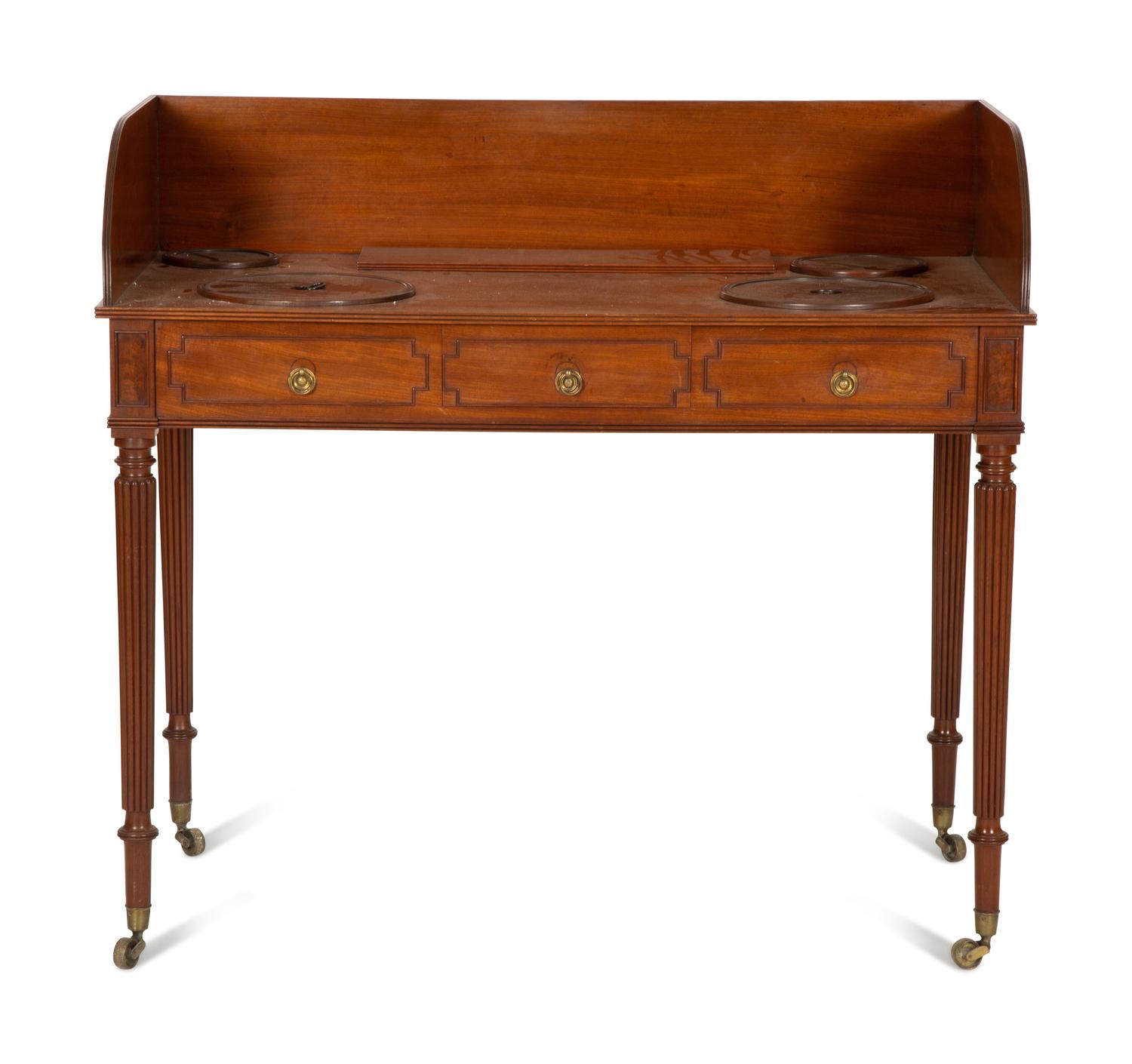 A Regency Mahogany Wash Stand with Original Covers for Bowl Cut-outs