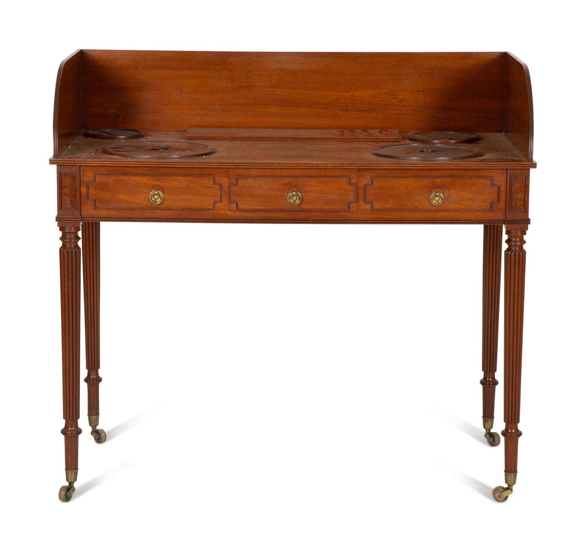 A Regency Mahogany Wash Stand with Original Covers for Bowl Cut-outs