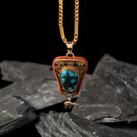 Herbert Taylor (Diné, 1951-1996) — 14K Gold Bisbee Turquoise, and Mediterranean Coral Pendant, with 22K Gold Chain