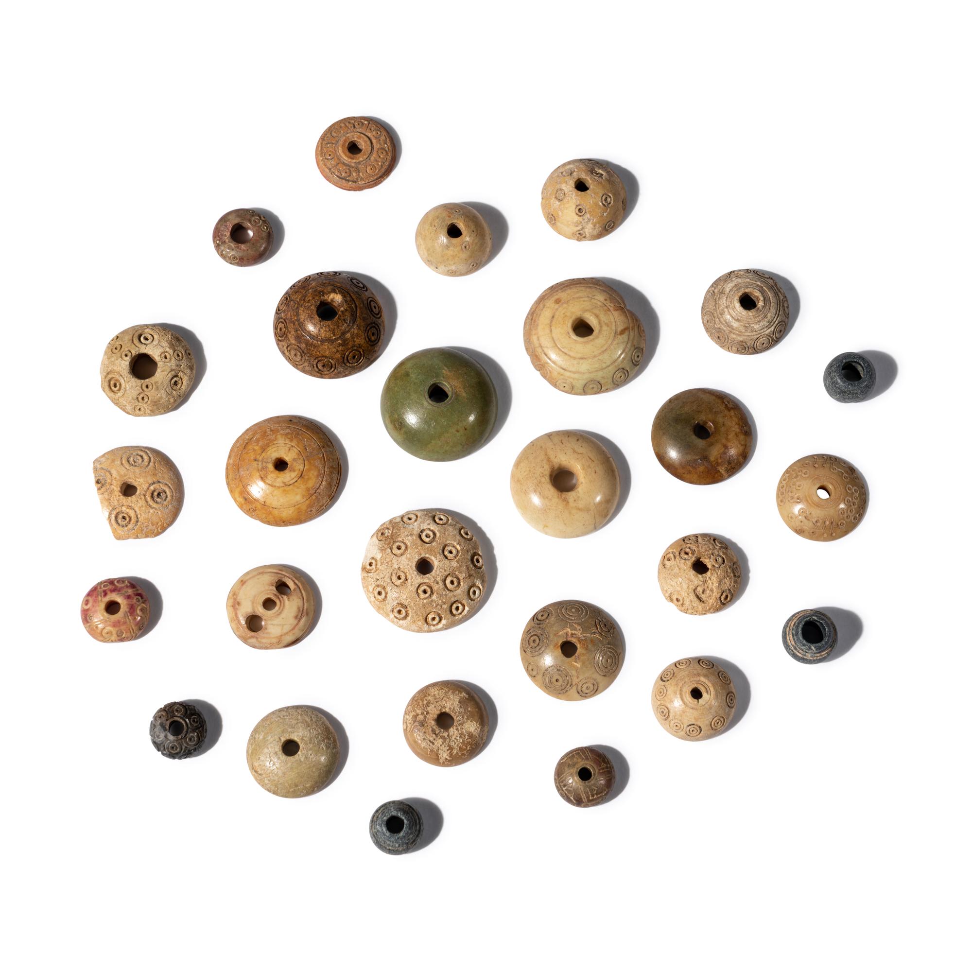 Twenty Seven Coptic Spindle Whorls