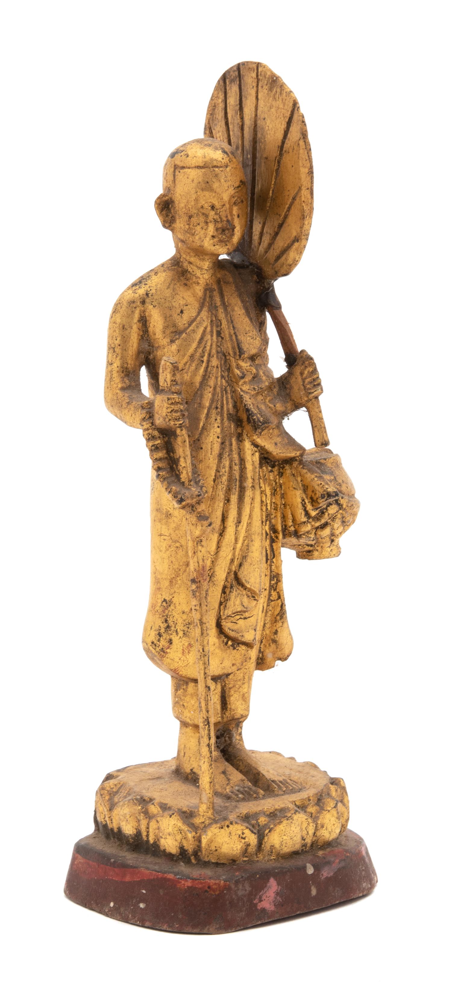 A Thai Gilt Lacquered Wood Figure of a Standing Monk Height 8 inches. — 20TH CENTURY