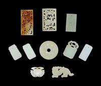 Ten Chinese Celadon, White, and Russet Jade Articles