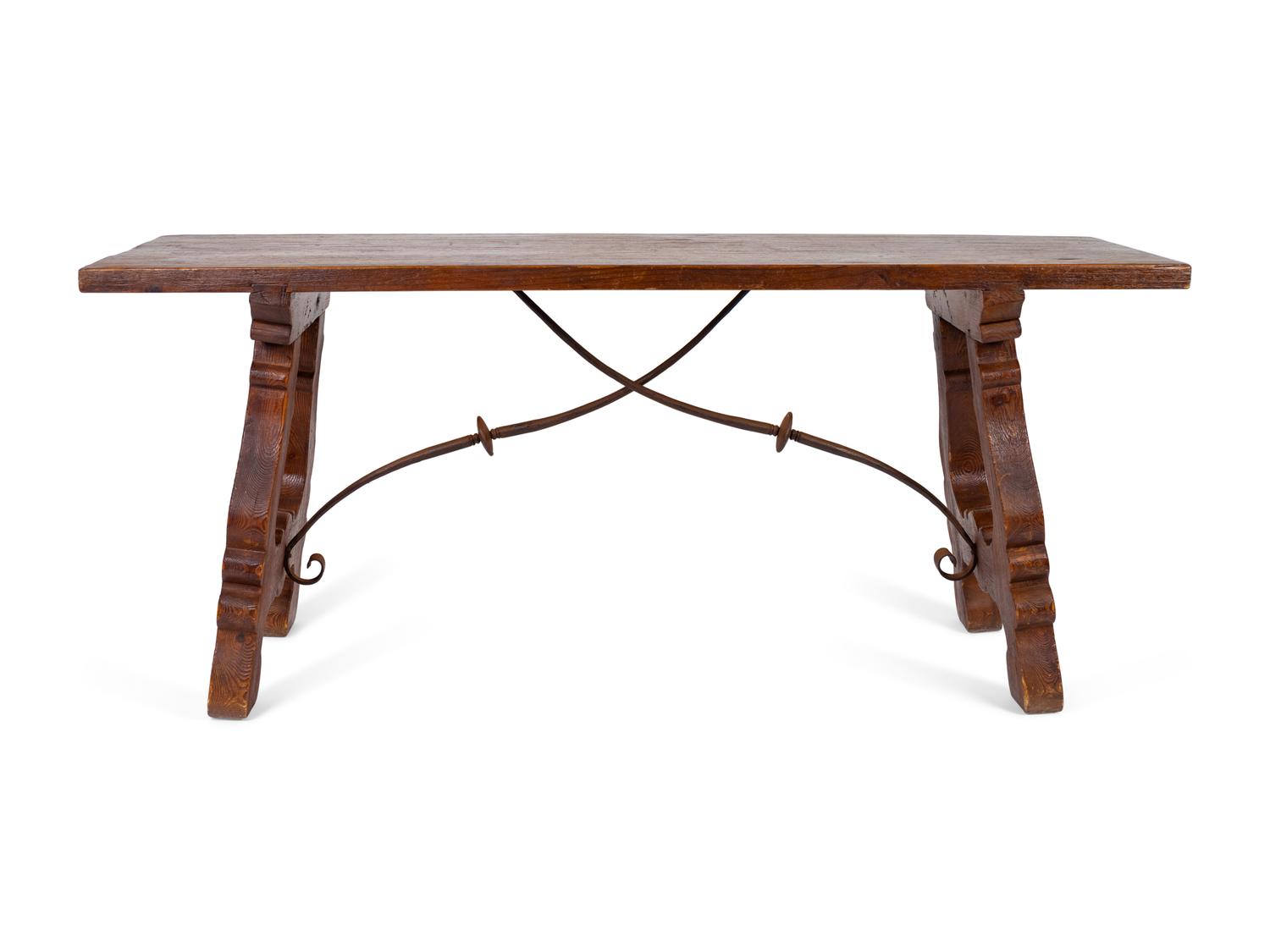 A Spanish Colonial Style Trestle Table With Wrought Iron Stretcher — 20TH CENTURY